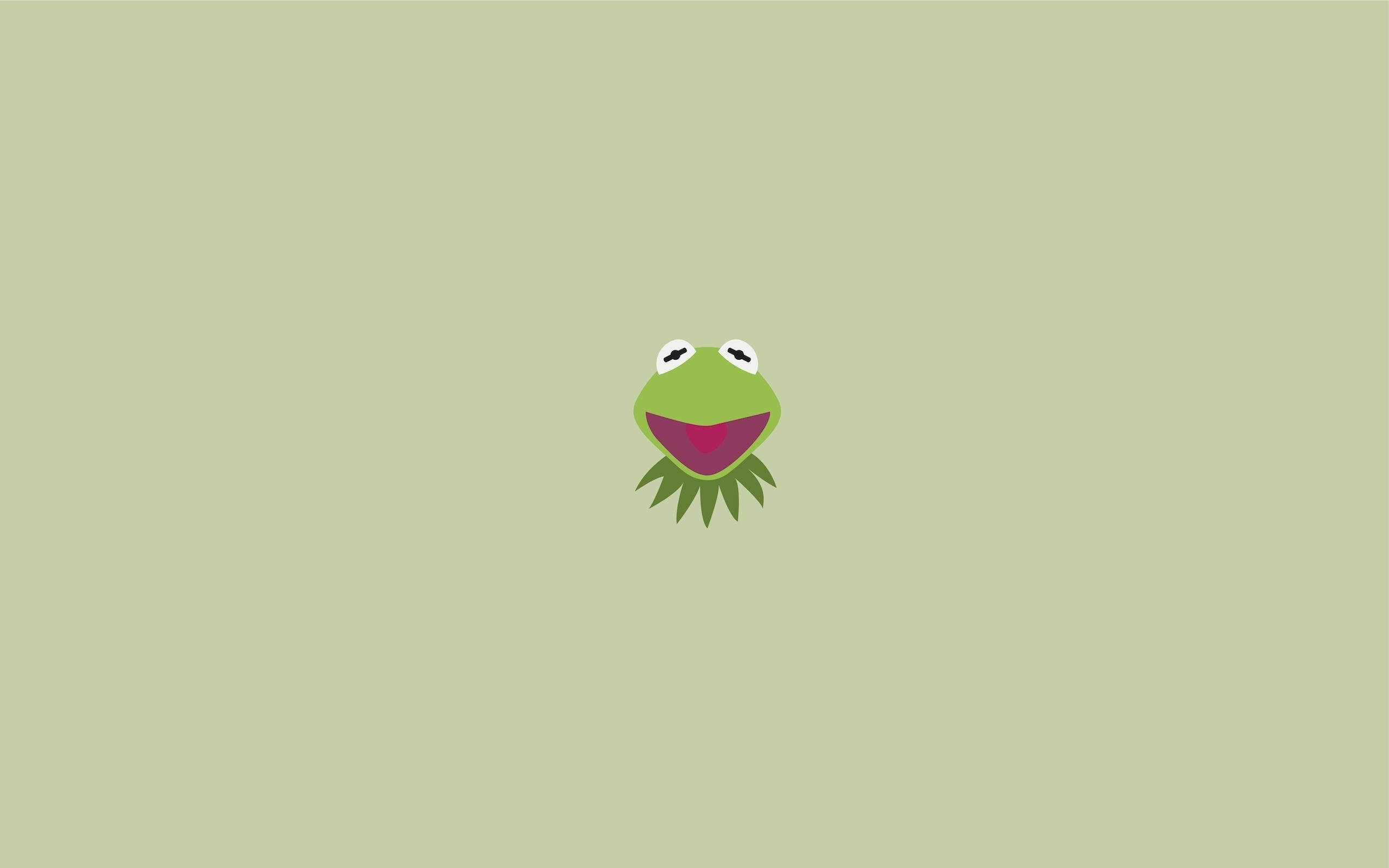 kermit 桌布 壁紙 — 一個極簡平面插圖，將青蛙柯米特的微笑臉龐置中於純鼠尾草綠色背景上。