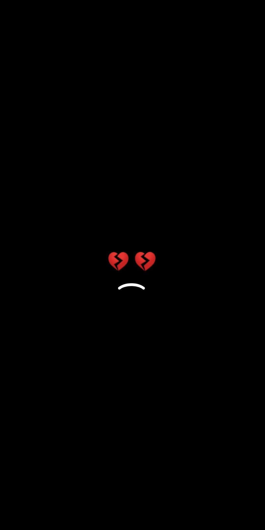 Broken Heart iPhone 桌布 壁紙 — 一個極簡悲傷面孔，帶有破碎的紅色心形眼睛，居中在純黑色背景上。
