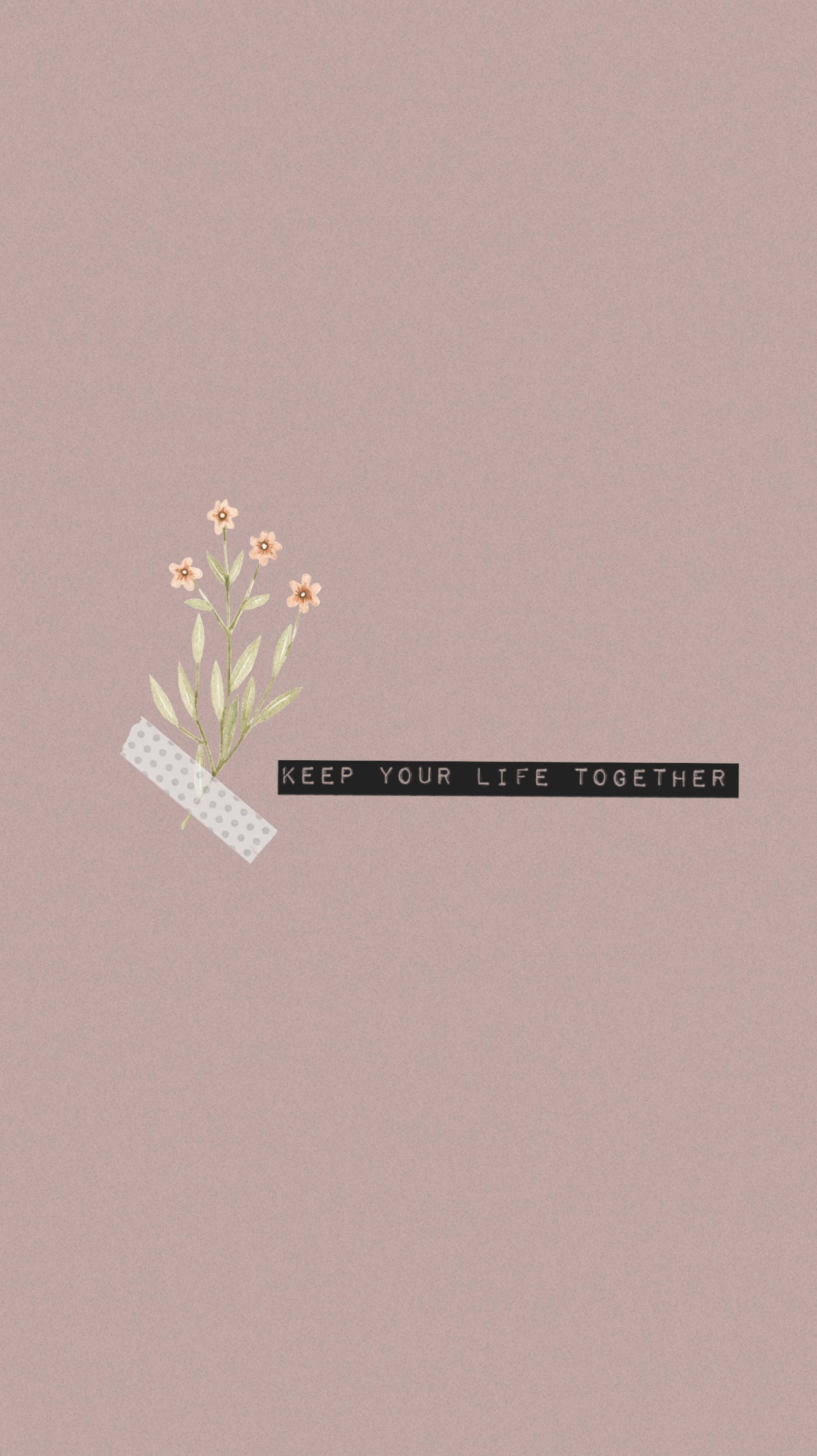 Pastel Minimalist 桌布 壁紙 — 一個極簡插畫，描繪一小束用膠帶貼在柔和粉紅色背景上的花束，並附有短語 keep your life together。