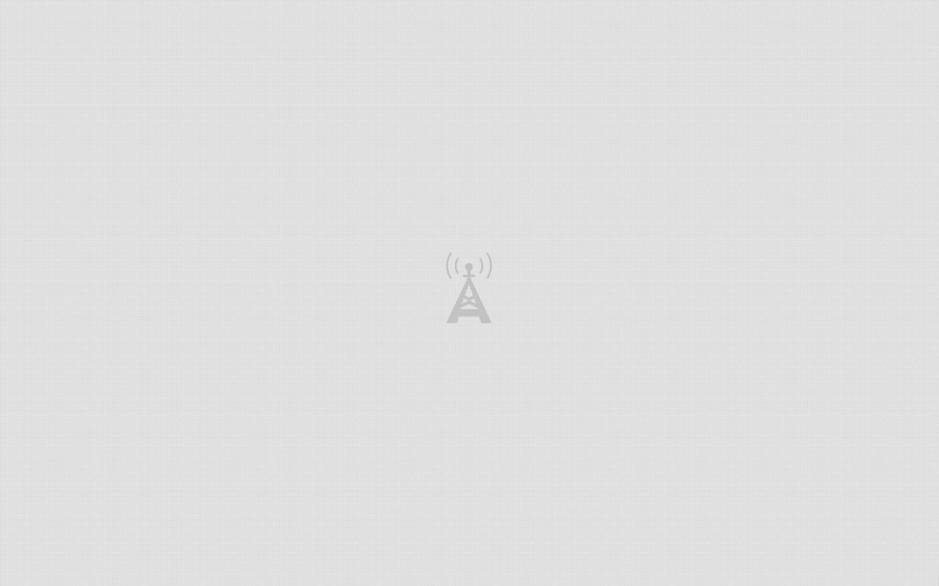 Minimalist Gray 桌布 壁紙 — 一個極簡灰色無線電塔圖示，居中於淺灰色紋理背景上。