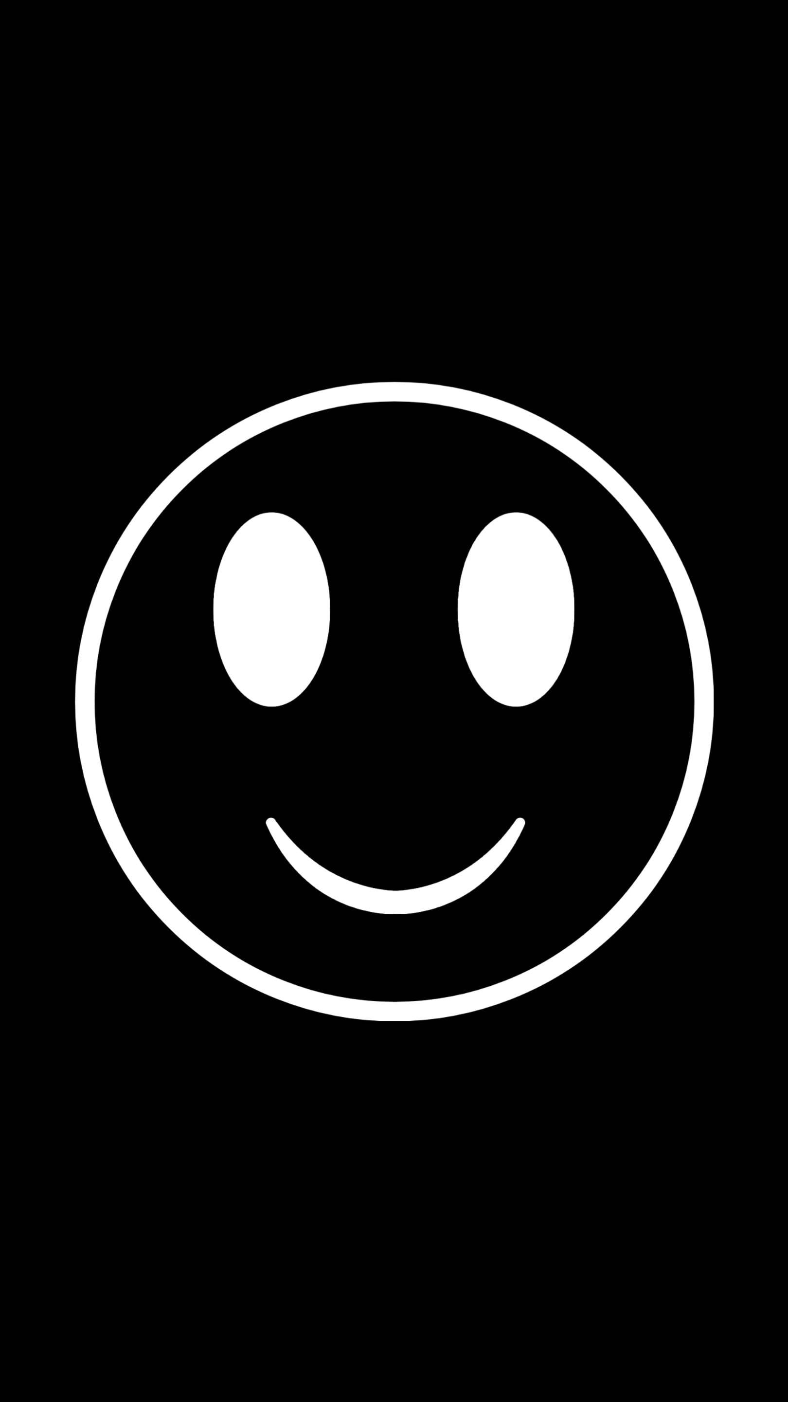Black Emoji 桌布 壁紙 — 一個極簡白色笑臉，帶有橢圓形眼睛和彎曲嘴巴，居中在純黑色背景上。