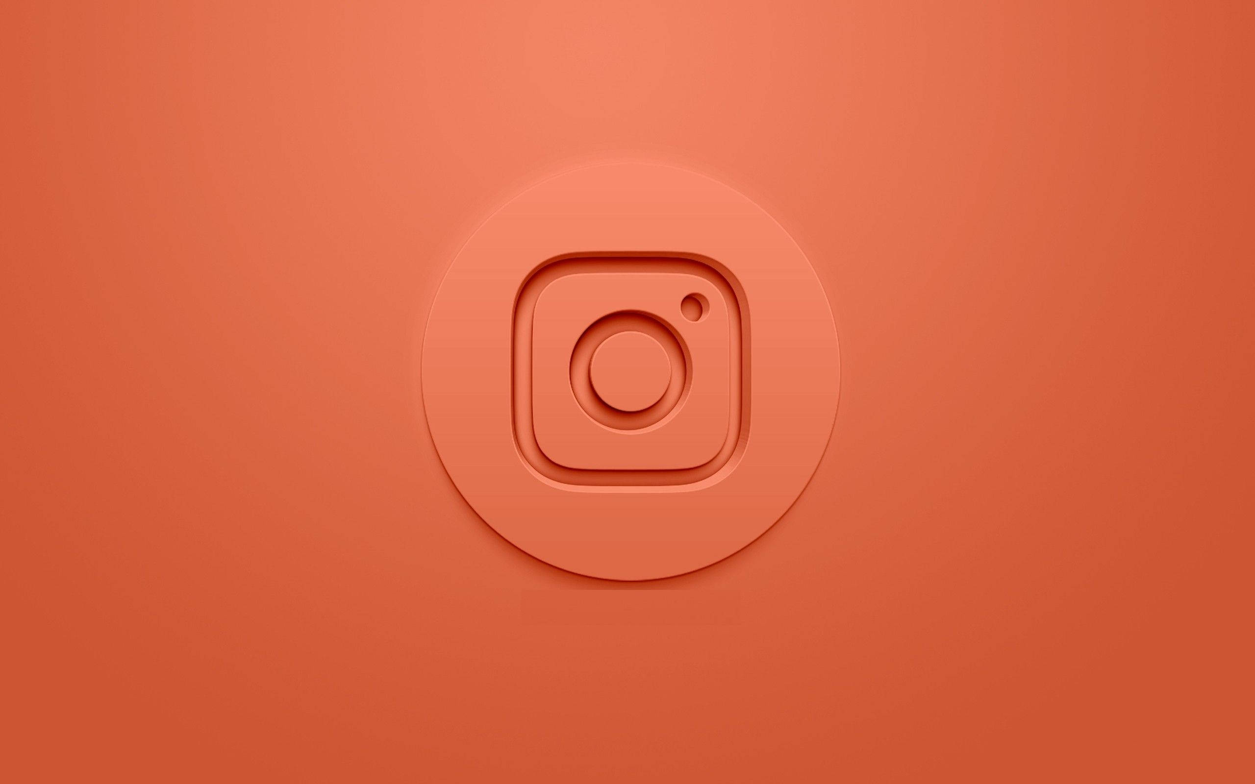 Instagram 桌布 壁紙 — 一個極簡的3D渲染Instagram標誌，居中放置在純色陶土背景上，帶有柔和陰影。