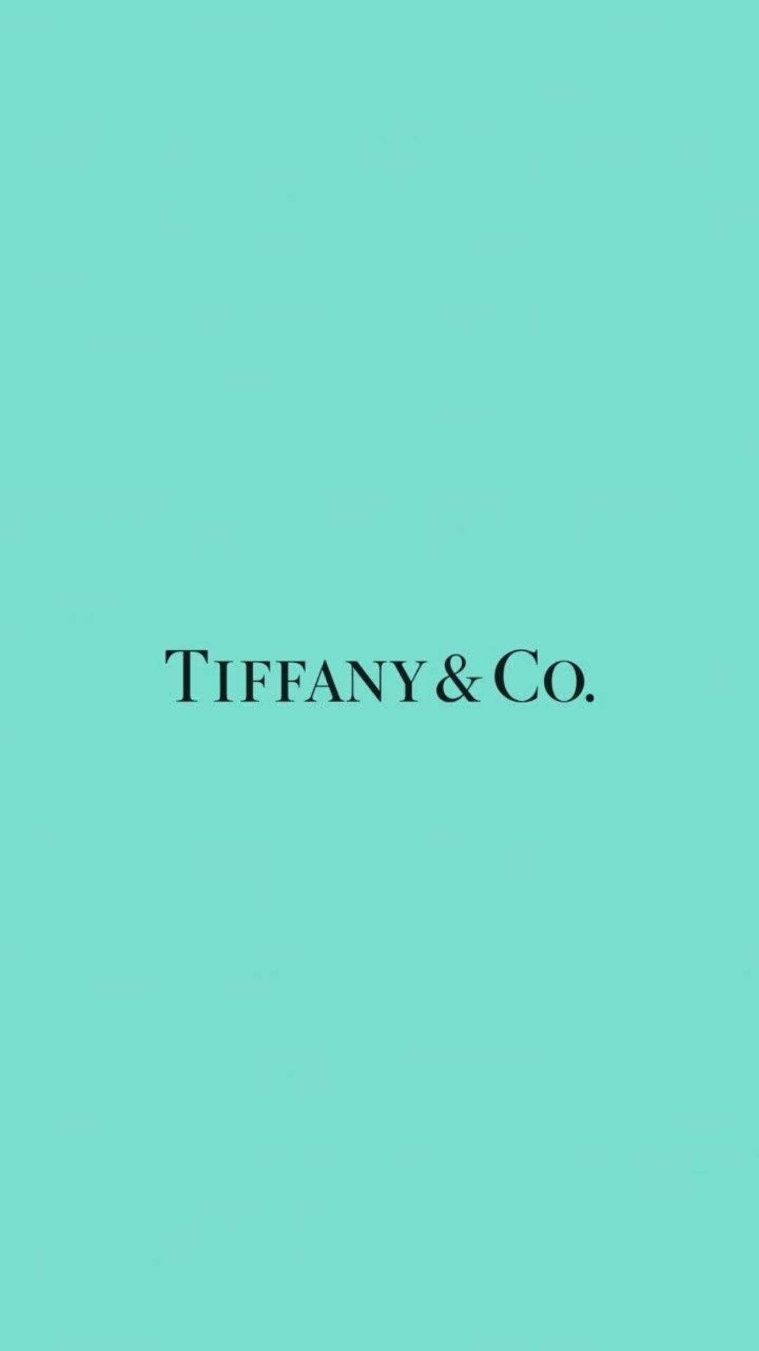 tiffany 桌布 壁紙 — 一個極簡的Tiffany & Co標誌居中於純知更鳥蛋藍色背景上。
