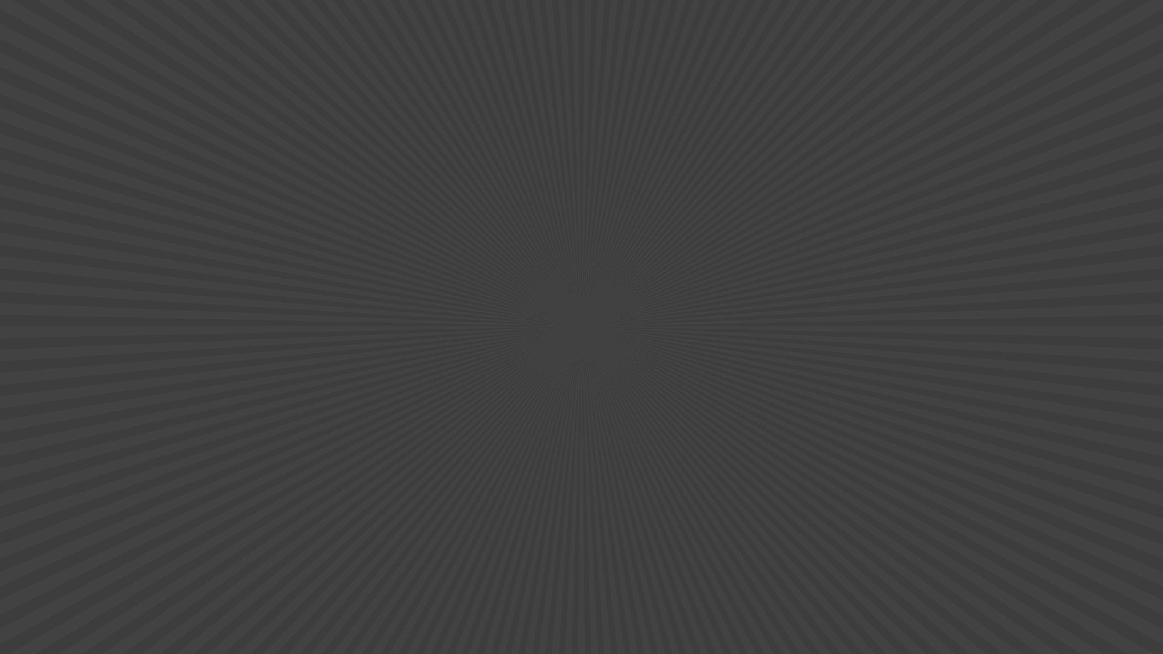 Grey Desktop 桌布 壁紙 — 一個極簡的深灰色放射狀圖案，細線條向中心點匯聚。