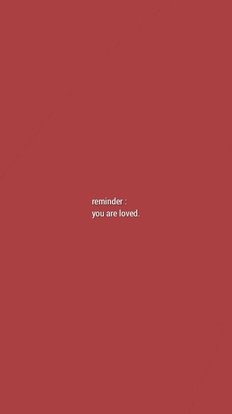 美學 桌布 壁紙 — 一個極簡的深紅色背景，中央有白色文字寫著 reminder you are loved。