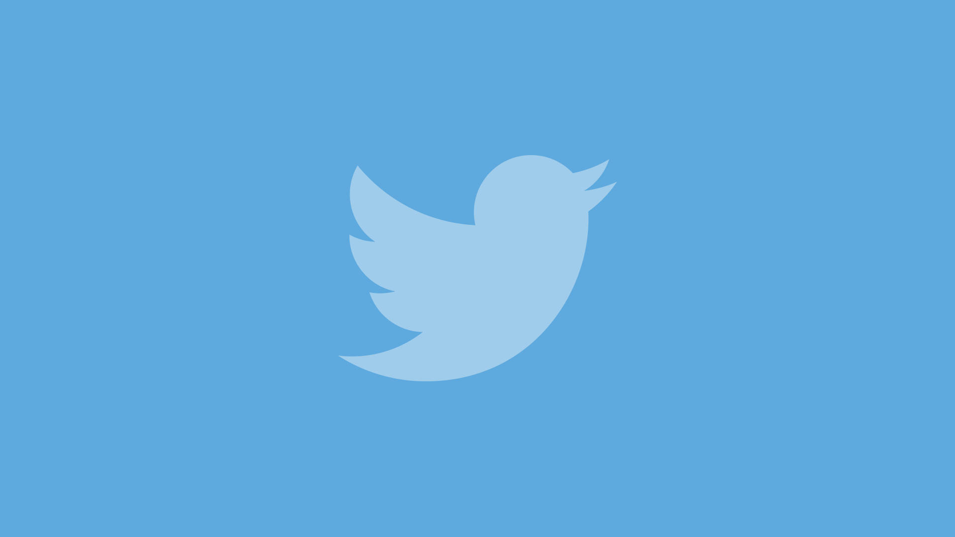 Twitter 桌布 壁紙 — 一個極簡的淺藍色Twitter鳥標誌，居中在純藍色背景上。