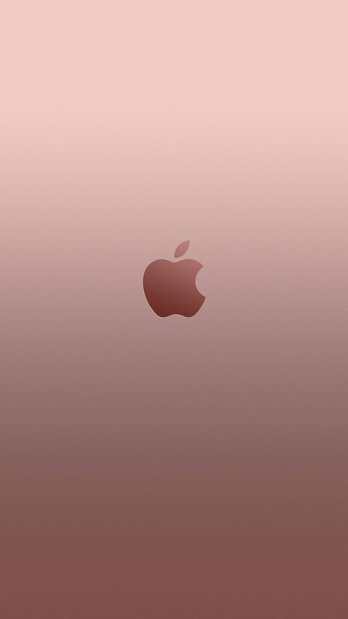 玫瑰金 iPhone 桌布 壁紙 — 一個極簡的玫瑰金漸變背景，中央有一個帶咬痕和葉子的Apple標誌。