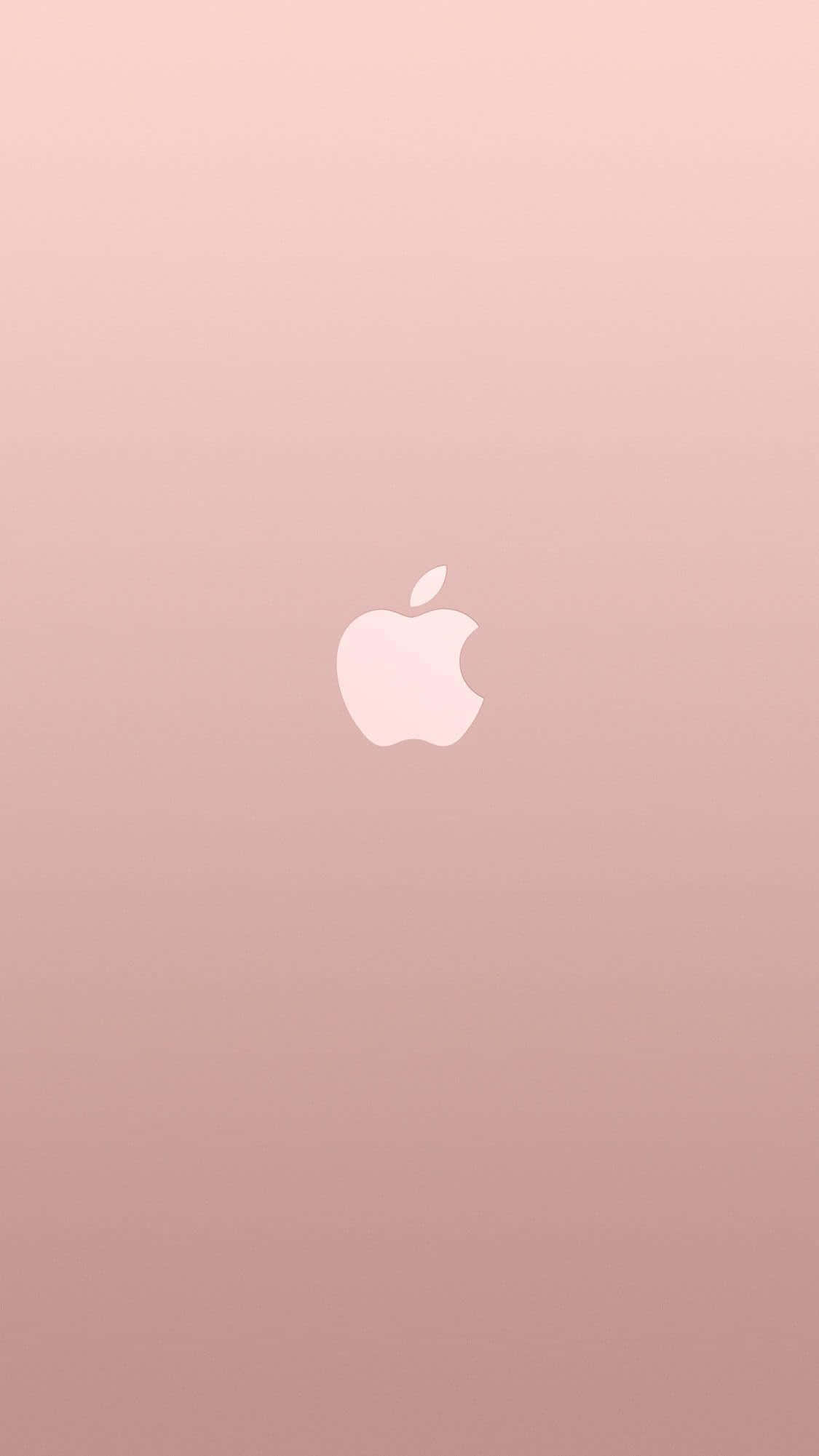 Rose Gold Color 桌布 壁紙 — 一個極簡的玫瑰金漸變背景，中央有一個白色的Apple標誌。