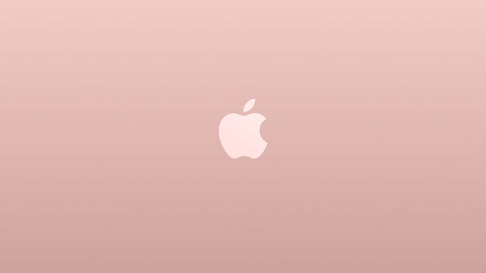 Rose Gold Desktop 桌布 壁紙 — 一個極簡的白色Apple標誌，居中於柔和的漸變玫瑰金背景上。