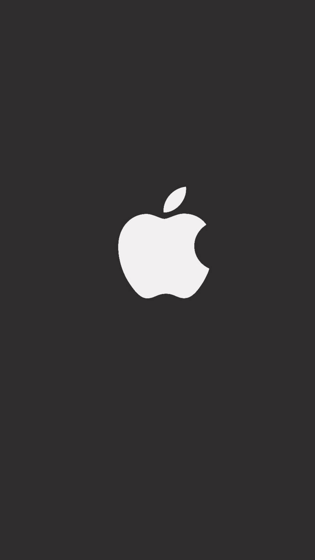 黑色 桌布 壁紙 — 一個極簡的白色Apple標誌，居中放置在純深灰色背景上。
