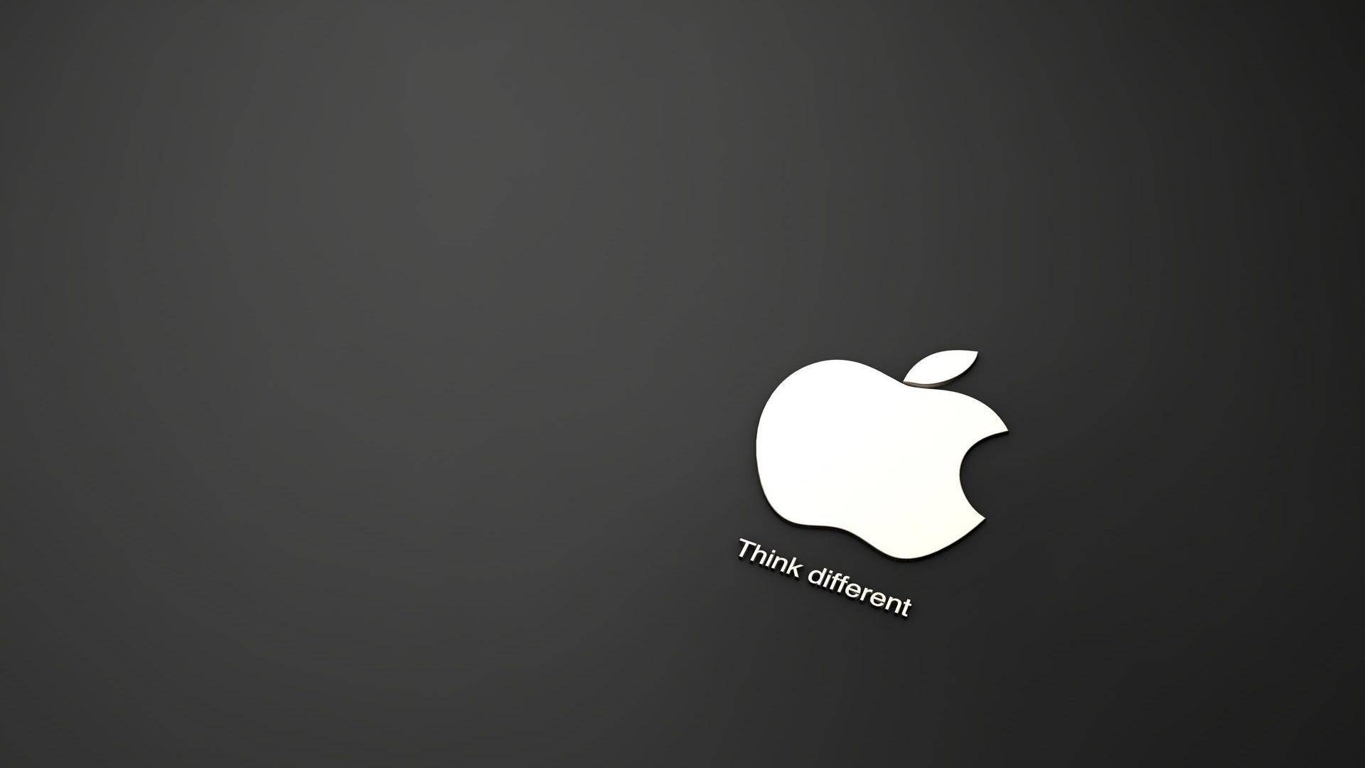 4K 桌布 壁紙 — 一個極簡的白色Apple標誌，帶有「Think different」文字，居中於深灰色漸變背景上。