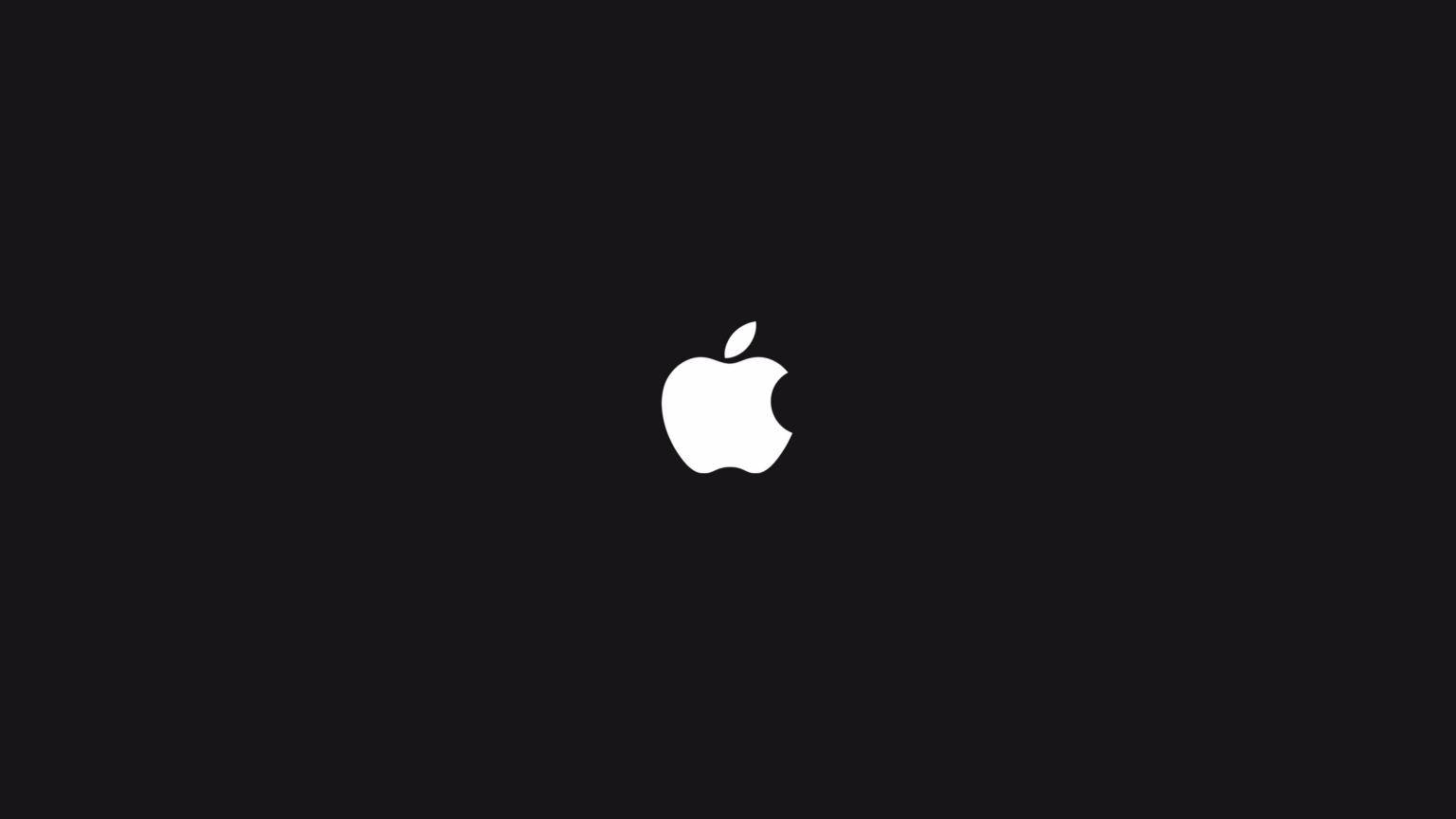 4K 桌布 壁紙 — 一個極簡的白色Apple標誌居中在純黑色背景上。