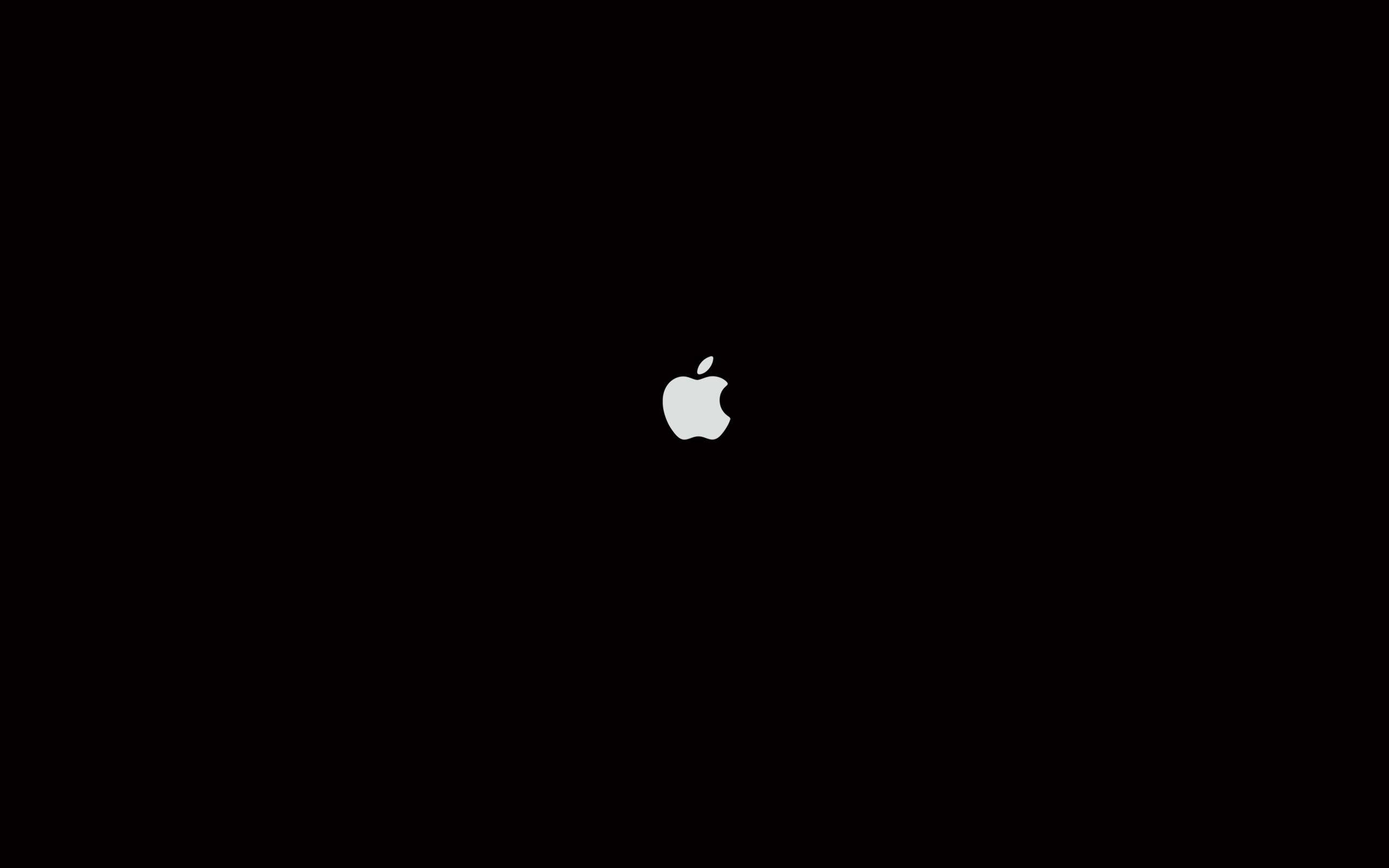 Plain Black 桌布 壁紙 — 一個極簡的白色Apple標誌居中在純黑色背景上。