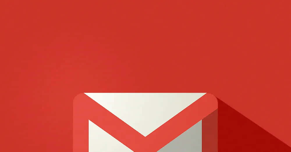 Gmail 動圖 桌布 壁紙 — 一個極簡的白色Gmail標誌帶有紅色點綴，在純紅色背景上投下長長的陰影。