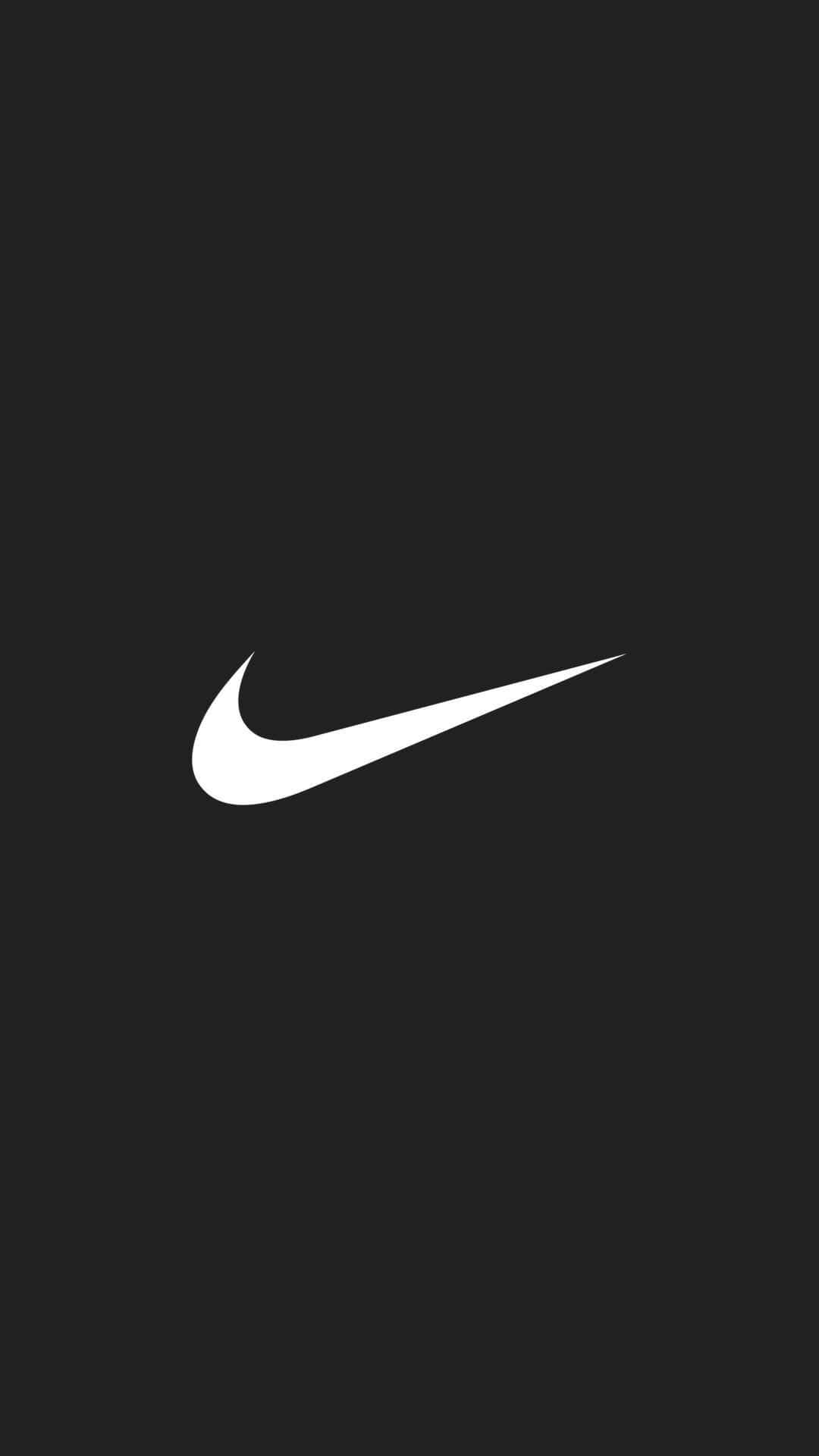 Nike 桌布 壁紙 — 一個極簡的白色Nike勾號標誌，居中放在純黑色背景上。