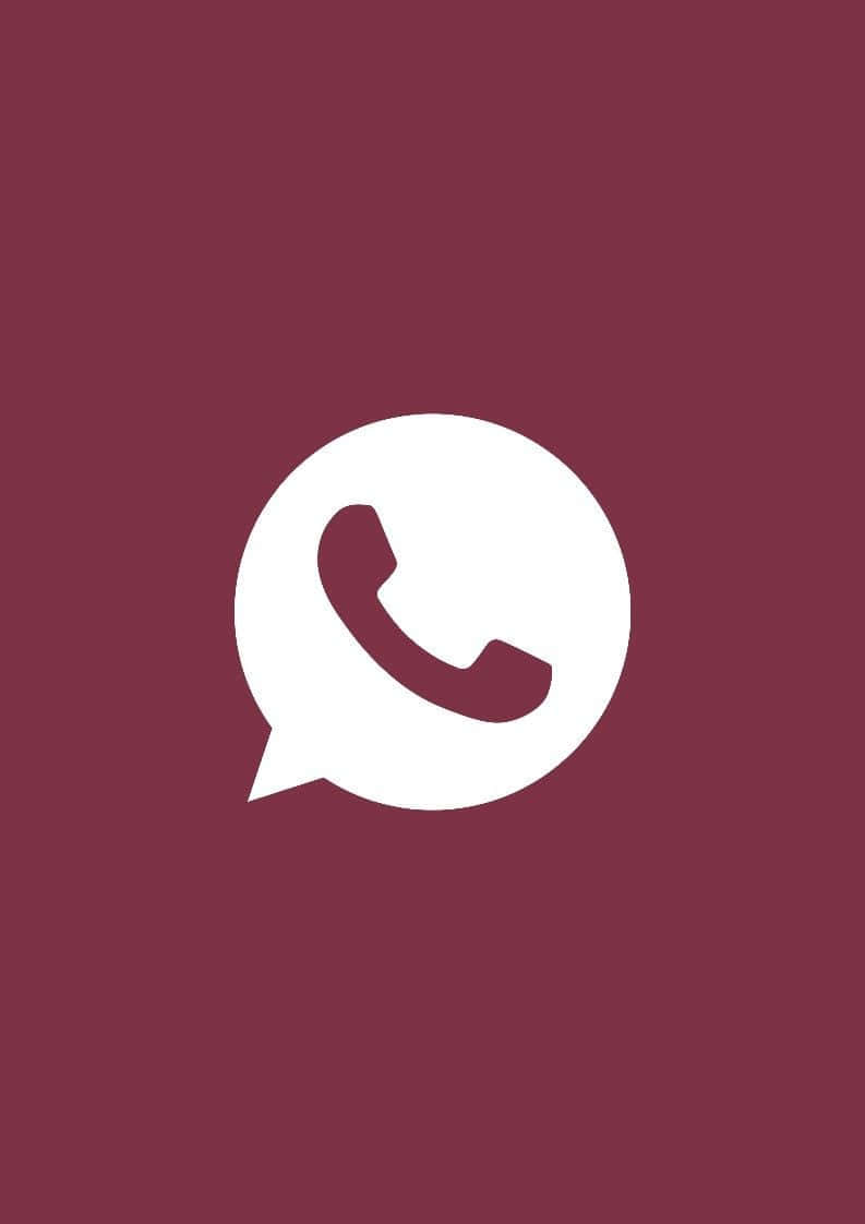 WhatsApp 桌布 壁紙 — 一個極簡的白色WhatsApp標誌居中在純勃艮第色背景上。