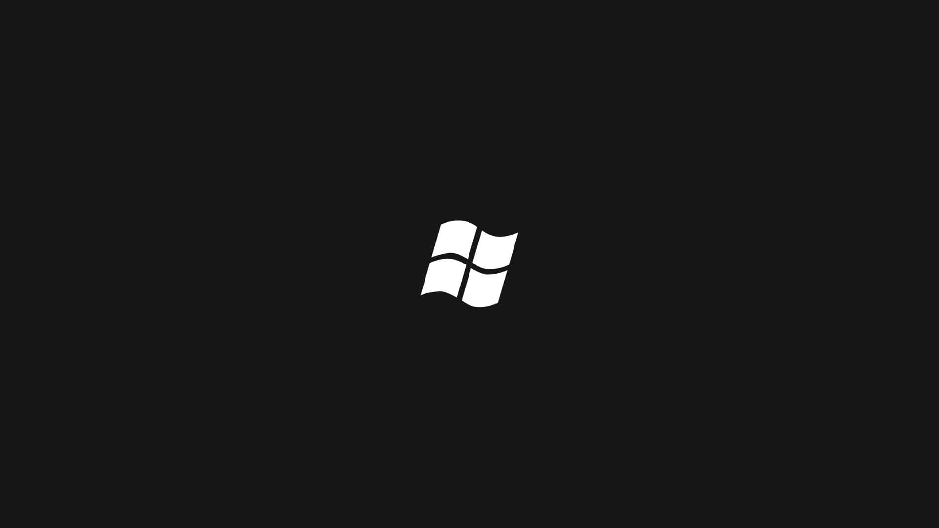 Simple Black 桌布 壁紙 — 一個極簡的白色Windows標誌，居中放置在純黑色背景上。