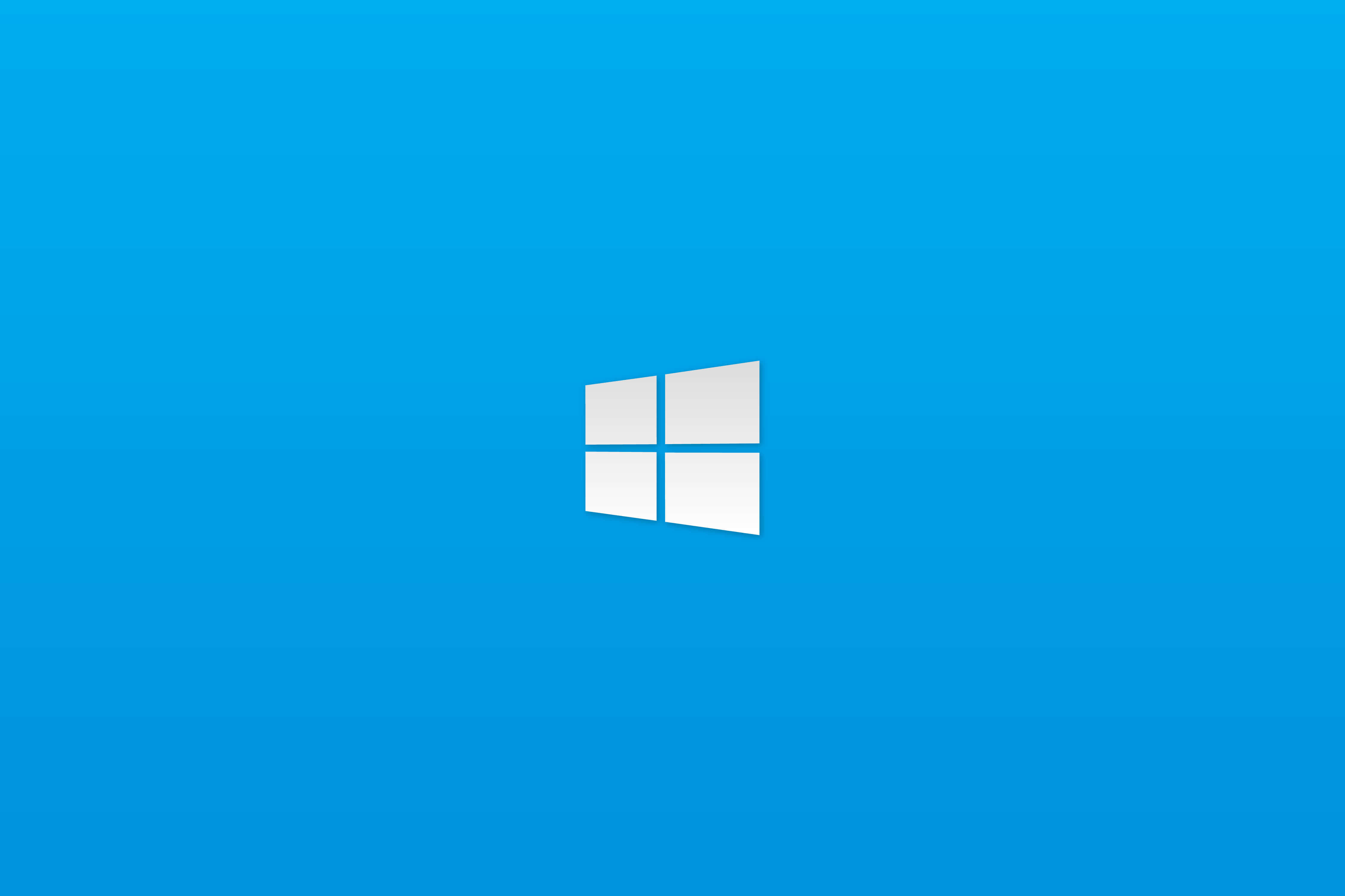 Windows Default 桌布 壁紙 — 一個極簡的白色Windows標誌，居中放置在純藍色漸變背景上。