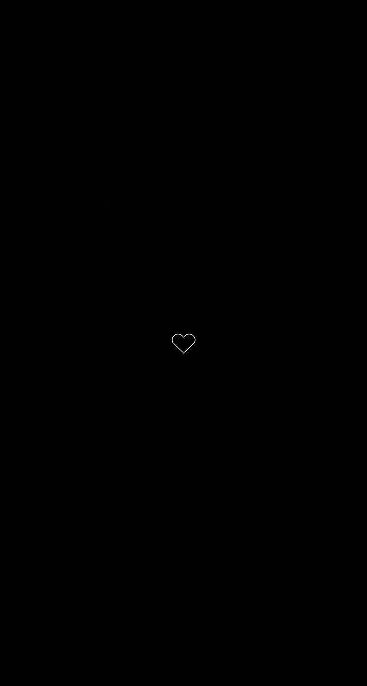 Dark Heart 桌布 壁紙 — 一個極簡的白色心形輪廓，居中放置在純黑色背景上。