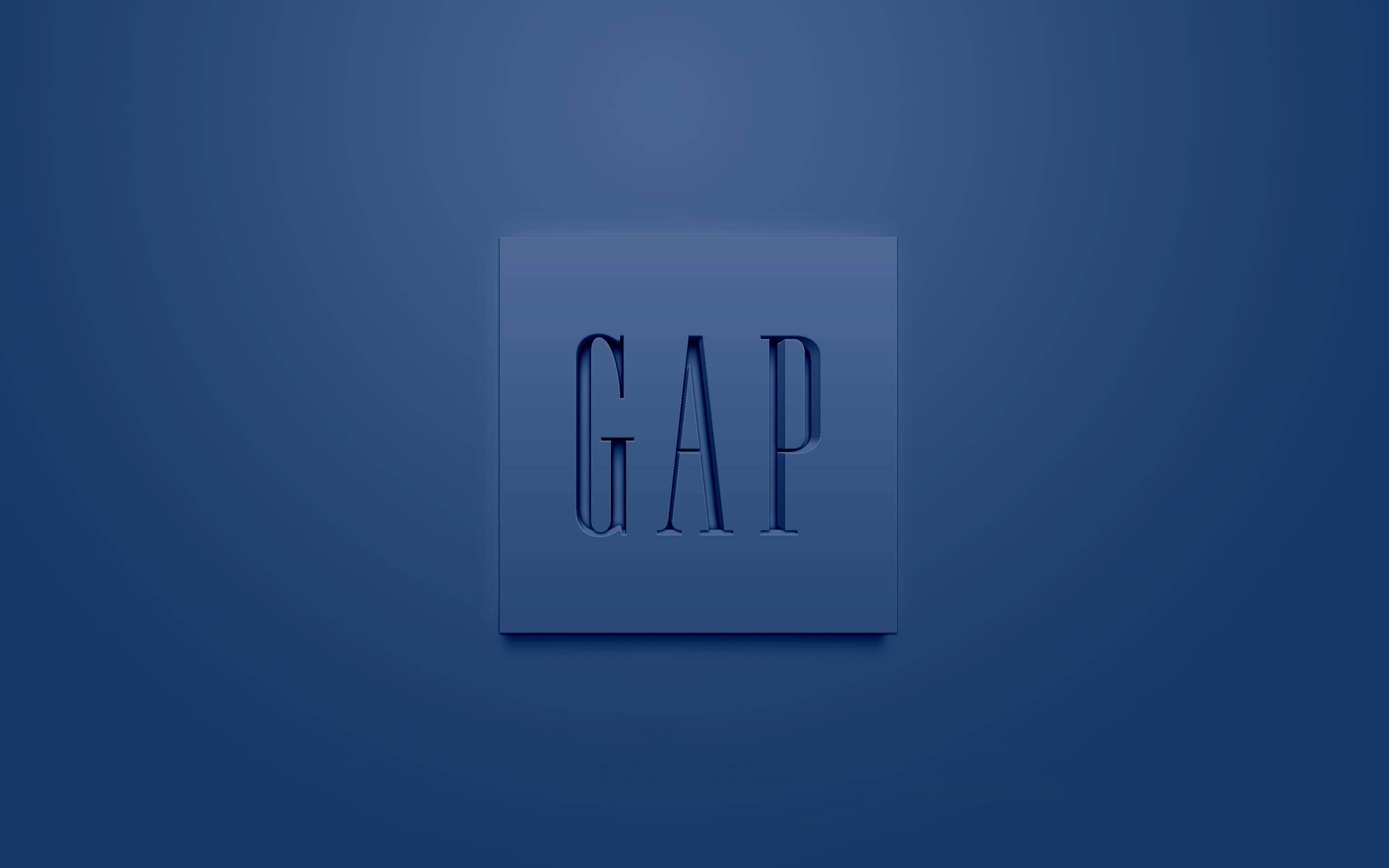 Gap 桌布 壁紙 — 一個極簡的藍色正方形標誌，中央有凸起的GAP字樣，背景為漸變藍色。