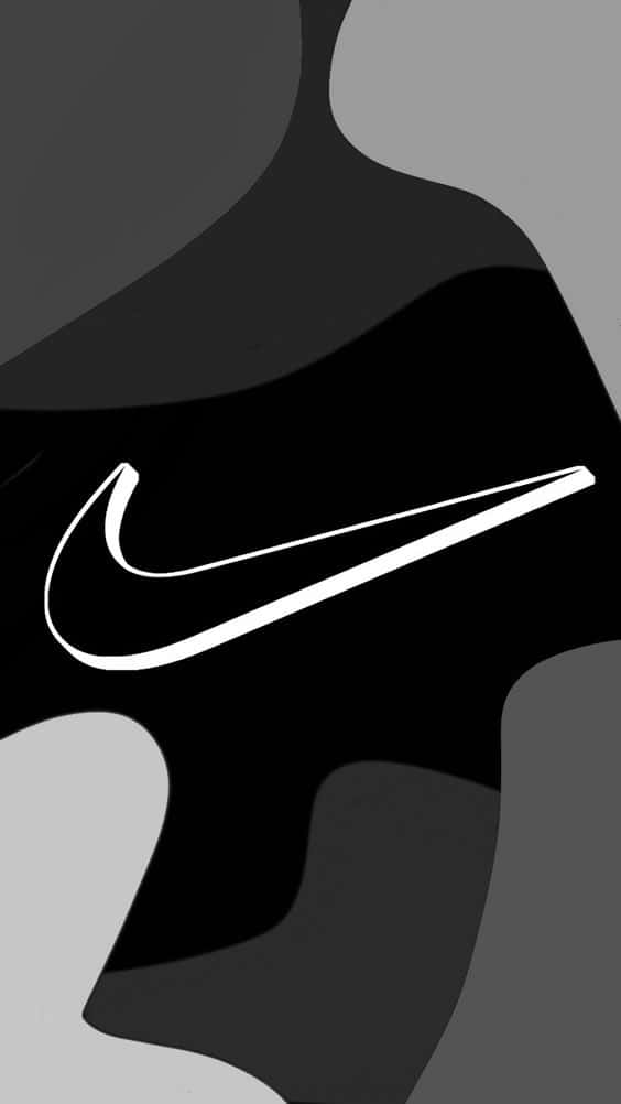 Nike 桌布 壁紙 — 一個極簡的黑白抽象背景，中央有一個大膽的白色Nike swoosh標誌。