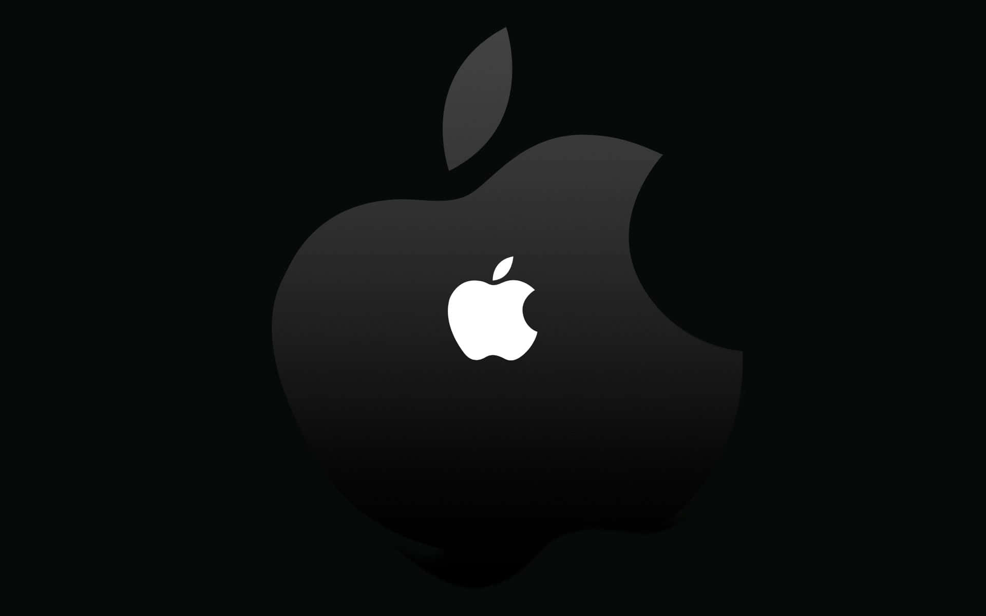 蘋果標誌 桌布 壁紙 — 一個極簡的黑色Apple標誌，中央有一個白色咬痕，位於純黑色背景上。