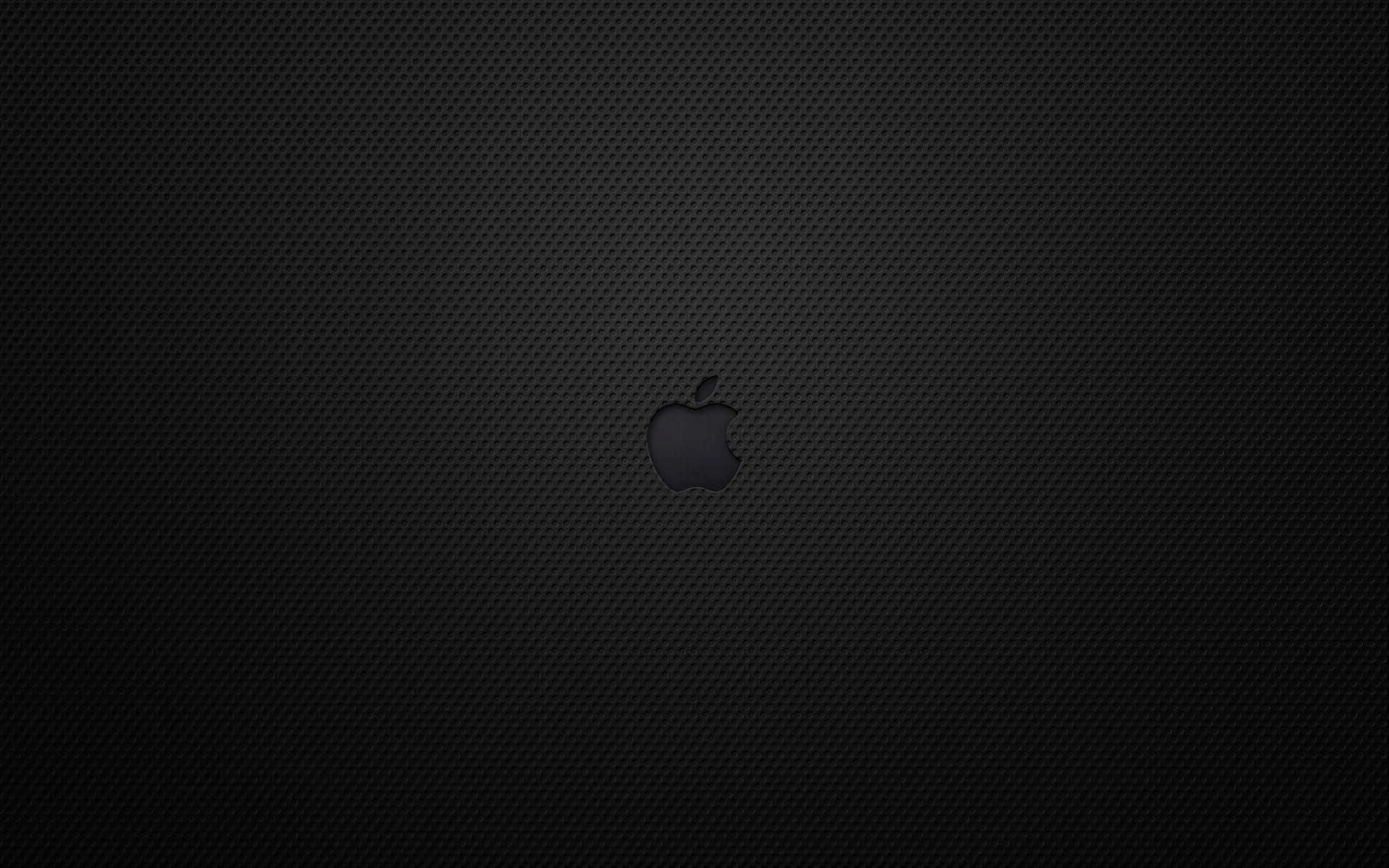 蘋果 桌布 壁紙 — 一個極簡的黑色Apple標誌，居中放置在帶有紋理的碳纖維背景上。