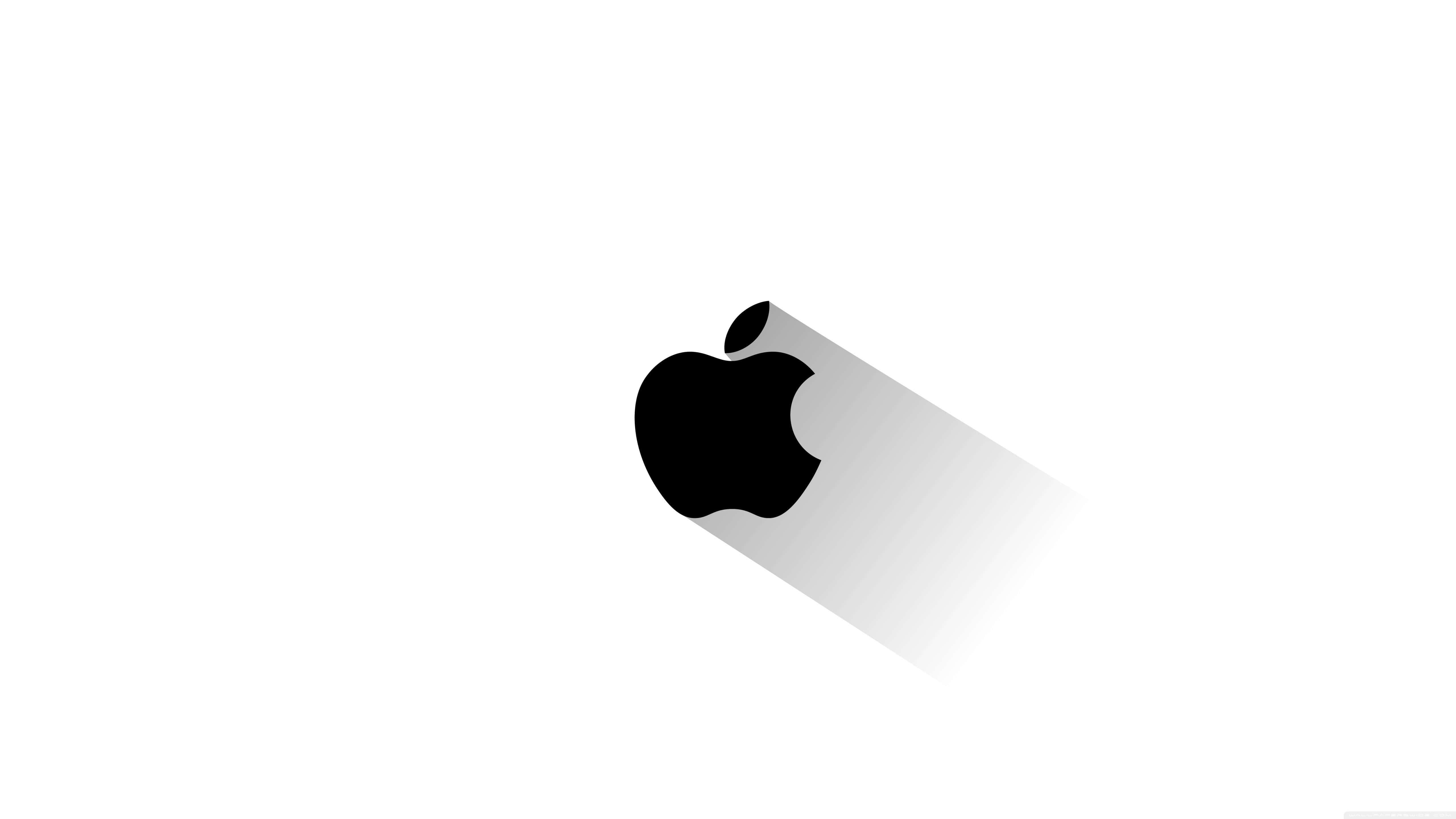 蘋果 桌布 壁紙 — 一個極簡的黑色Apple標誌在純白背景上投射出柔和的灰色陰影。