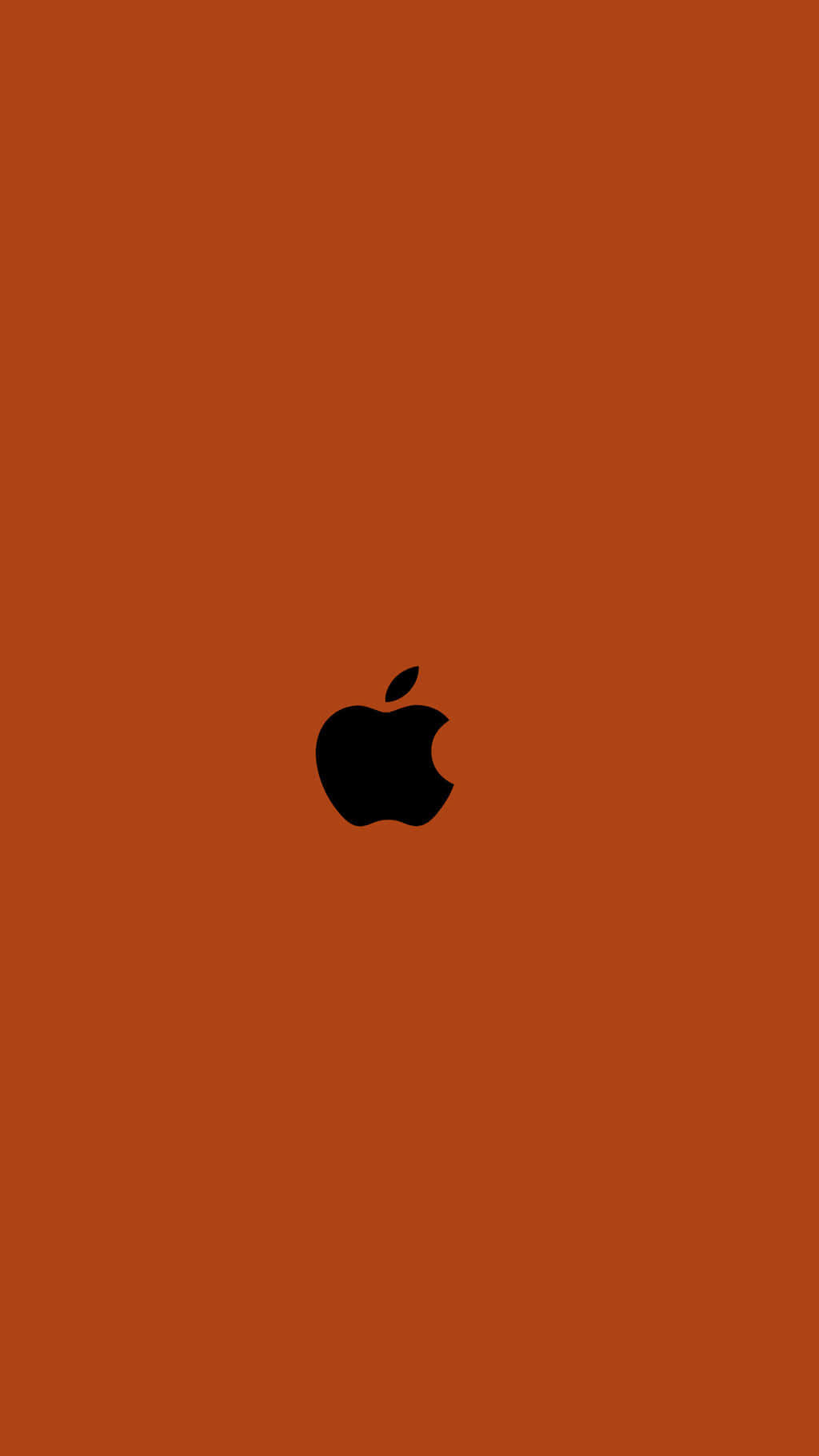 蘋果 桌布 壁紙 — 一個極簡的黑色Apple標誌居中在純焦橙色背景上。