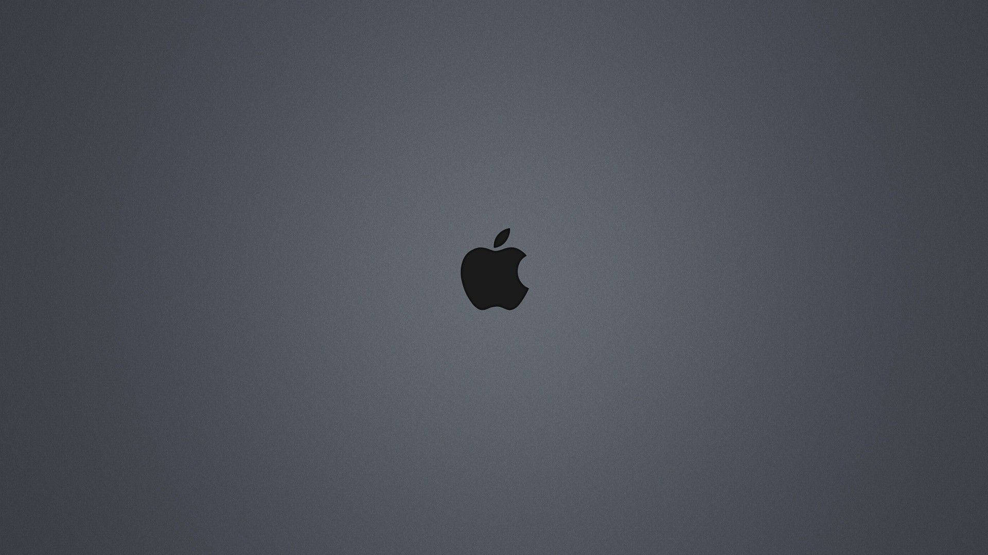 蘋果 桌布 壁紙 — 一個極簡的黑色Apple標誌居中在漸變灰色背景上。
