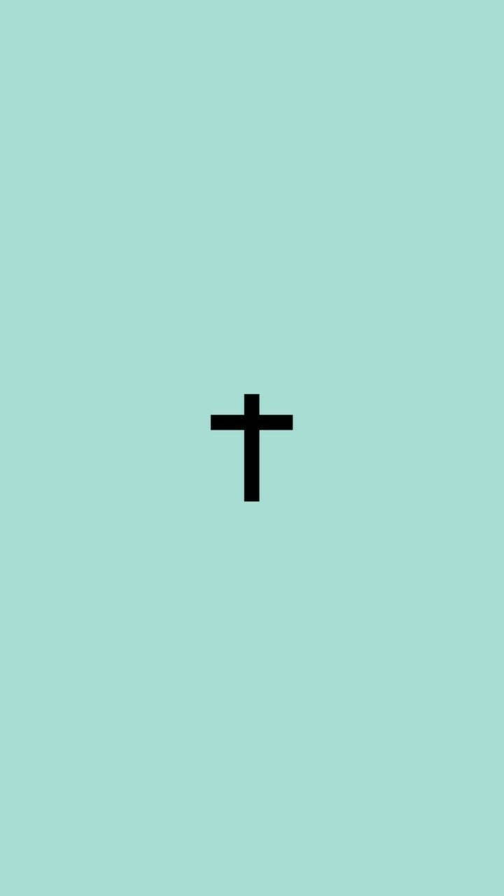 Cute Girly Cross 桌布 壁紙 — 一個極簡的黑色十字架居中於純薄荷綠色背景上。