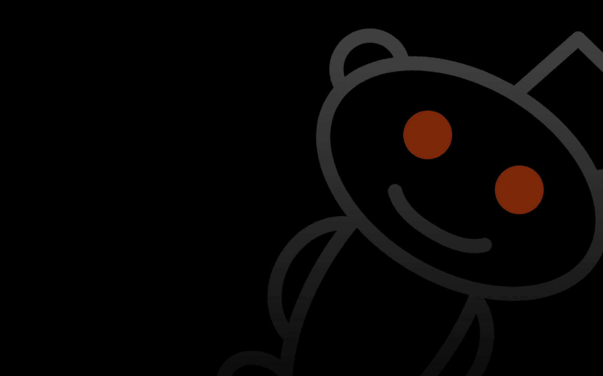 Reddit 桌布 壁紙 — 一個極簡的黑色和橙色笑臉卡通吉祥物標誌，背景為純黑色。