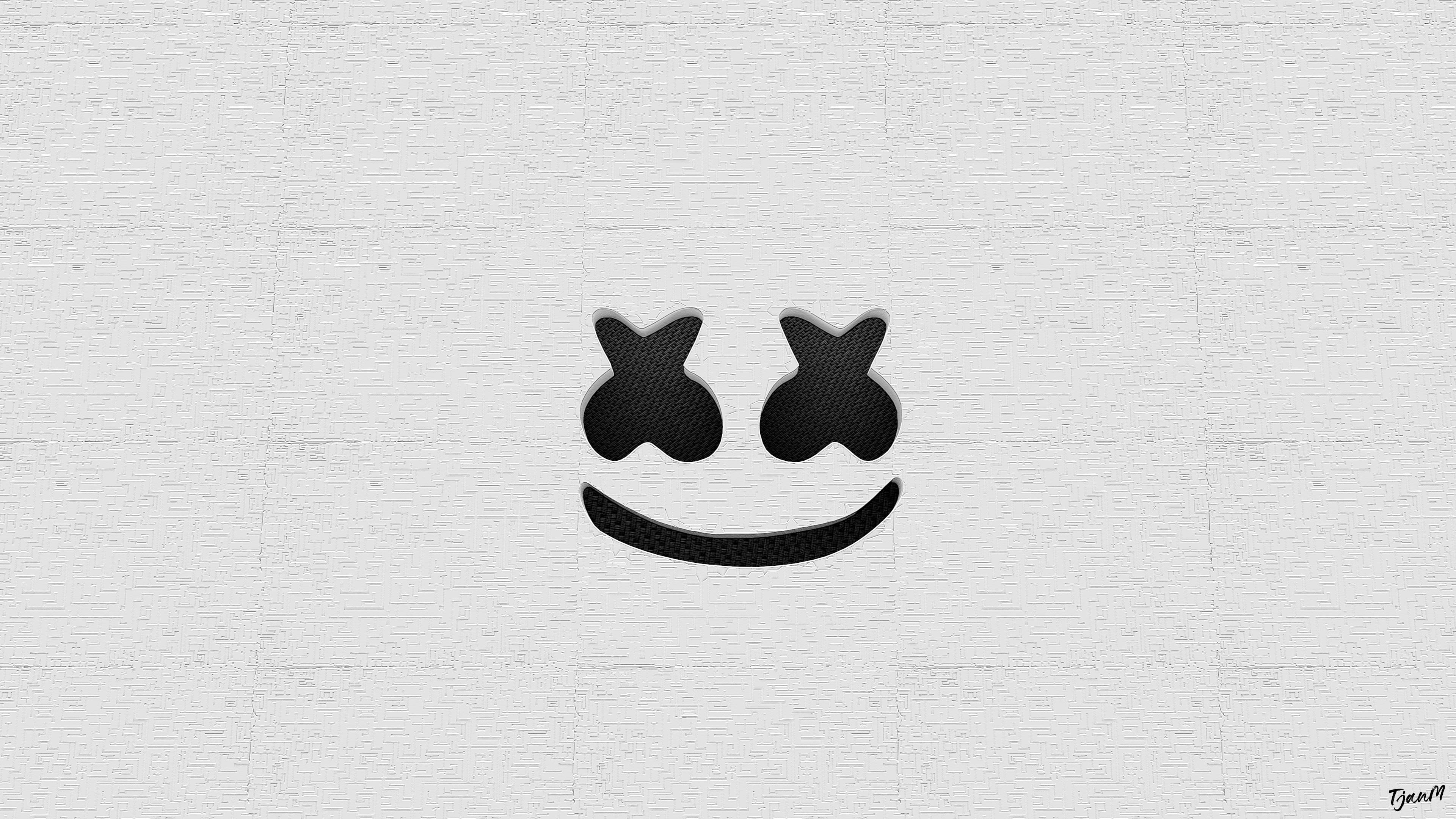 Marshmello 4K 桌布 壁紙 — 一個極簡的黑色笑臉，帶有星形眼睛，置於有紋理的白色背景上。