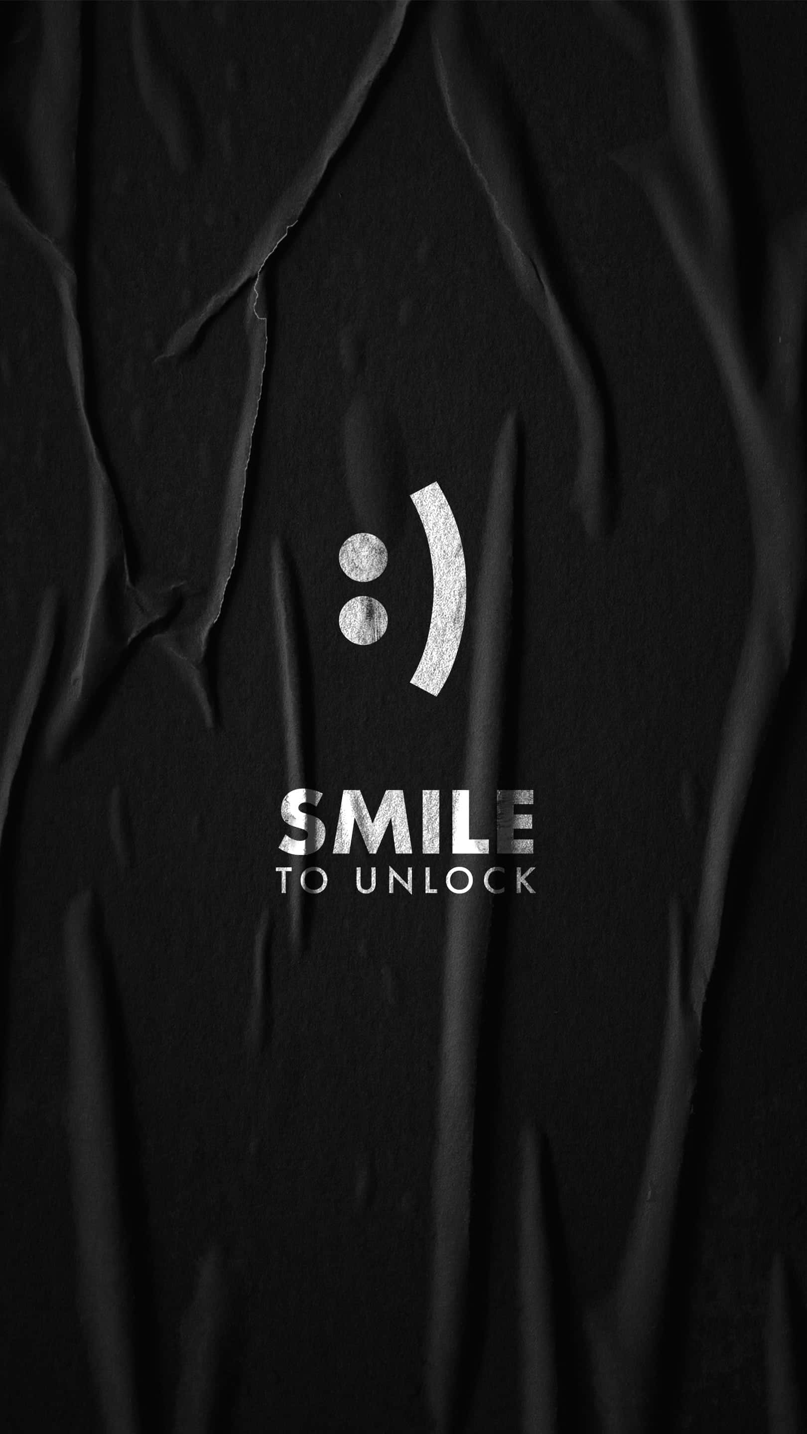 Smile 桌布 壁紙 — 一個極簡的黑色紋理背景，上面有一個銀色笑臉圖示和粗體白色文字 smile to unlock。