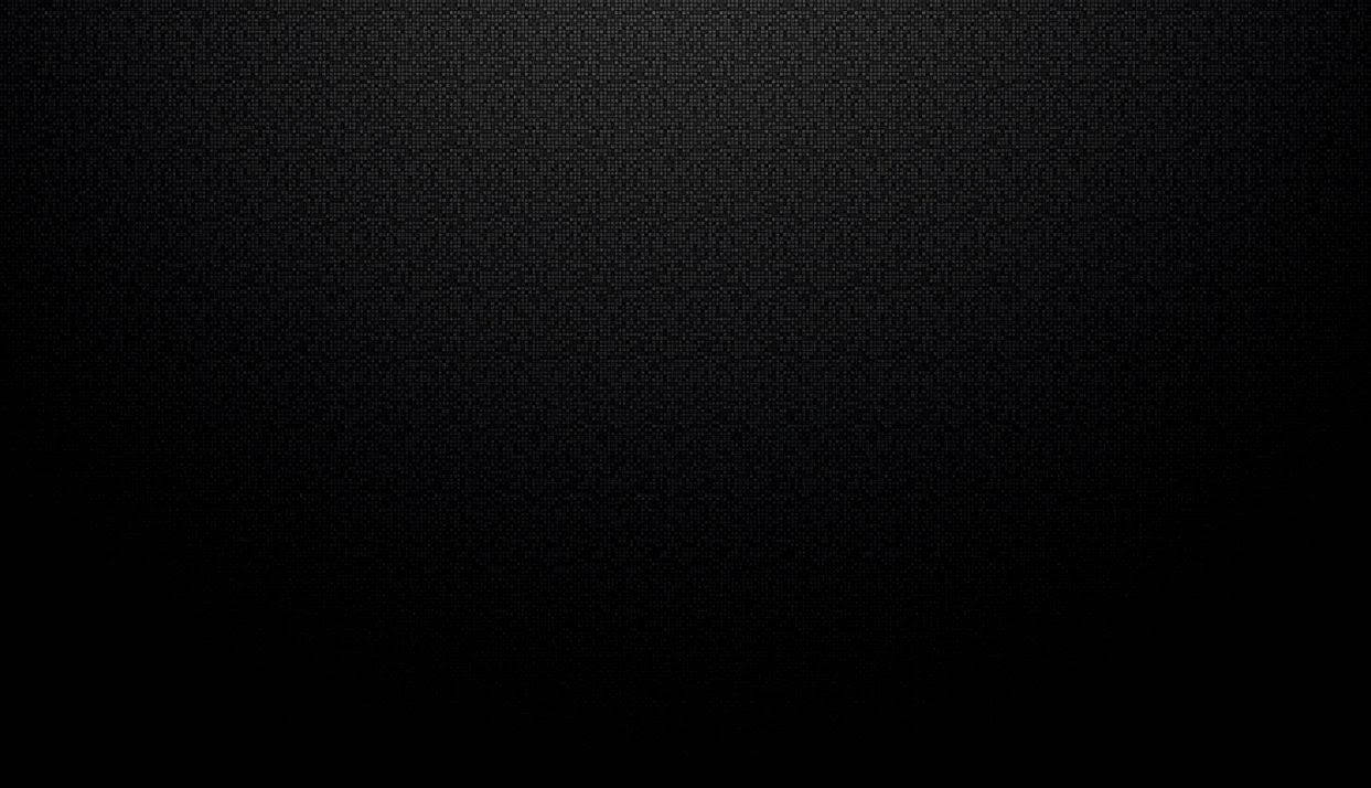 漸層 桌布 壁紙 — 一個極簡的黑色紋理背景，帶有從頂部中央而來的微妙漸變照明。