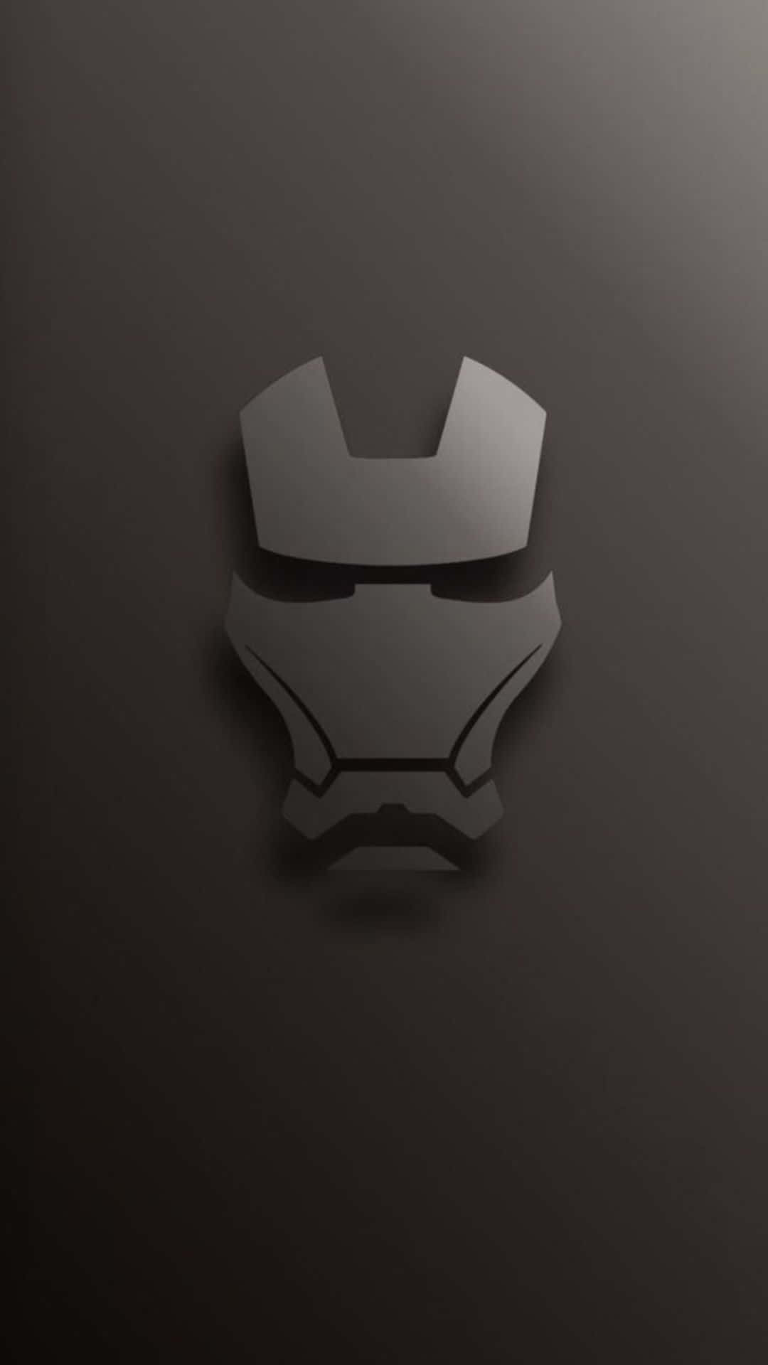 Android Iron Man 桌布 壁紙 — 一個極簡金屬質感的鋼鐵人頭盔剪影，居中在漸變深灰色背景上。