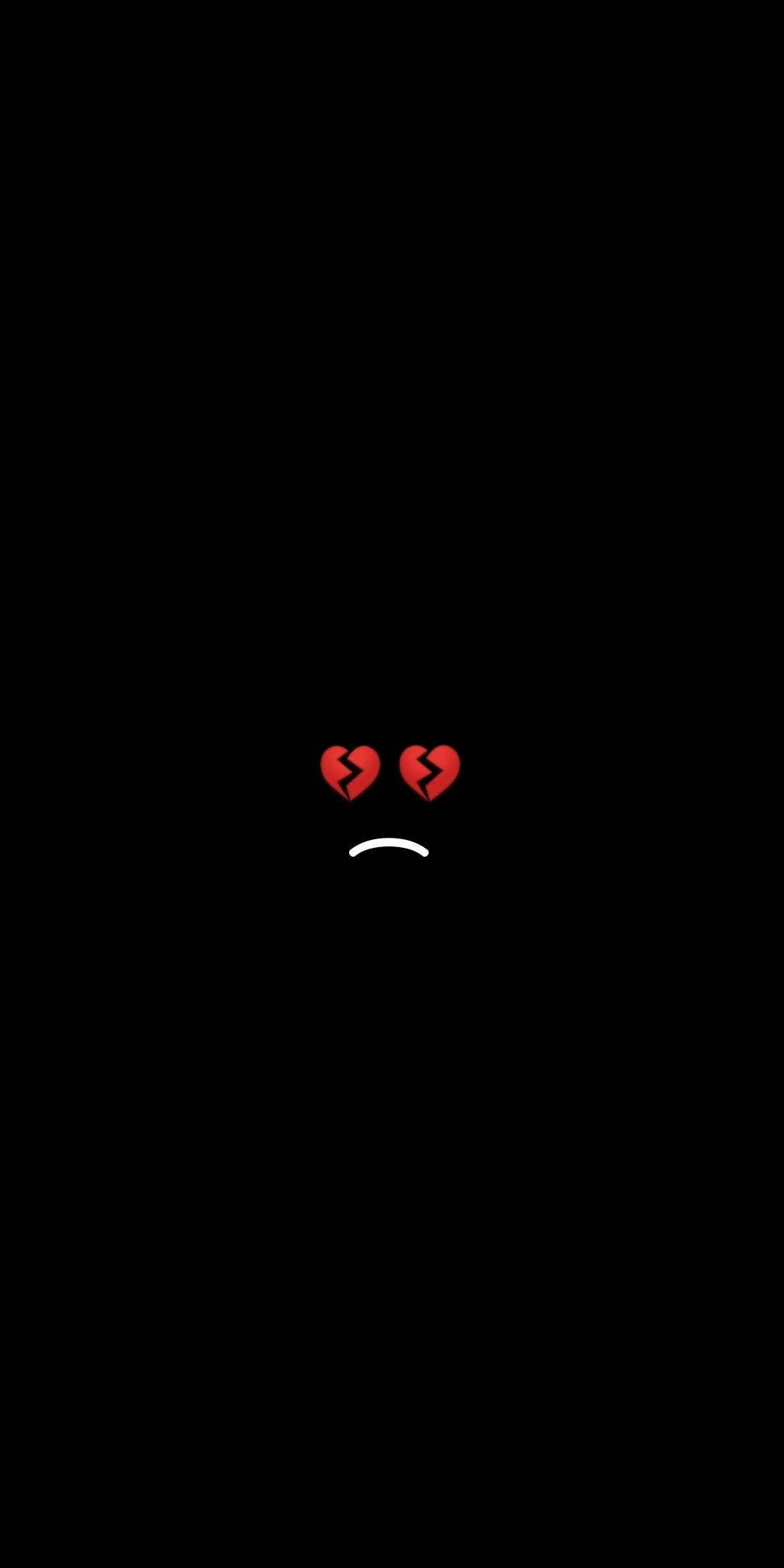 Sad Emoji 桌布 壁紙 — 一個極簡風格的悲傷面孔，帶有破碎的紅色心形眼睛和白色皺眉，背景為純黑色。