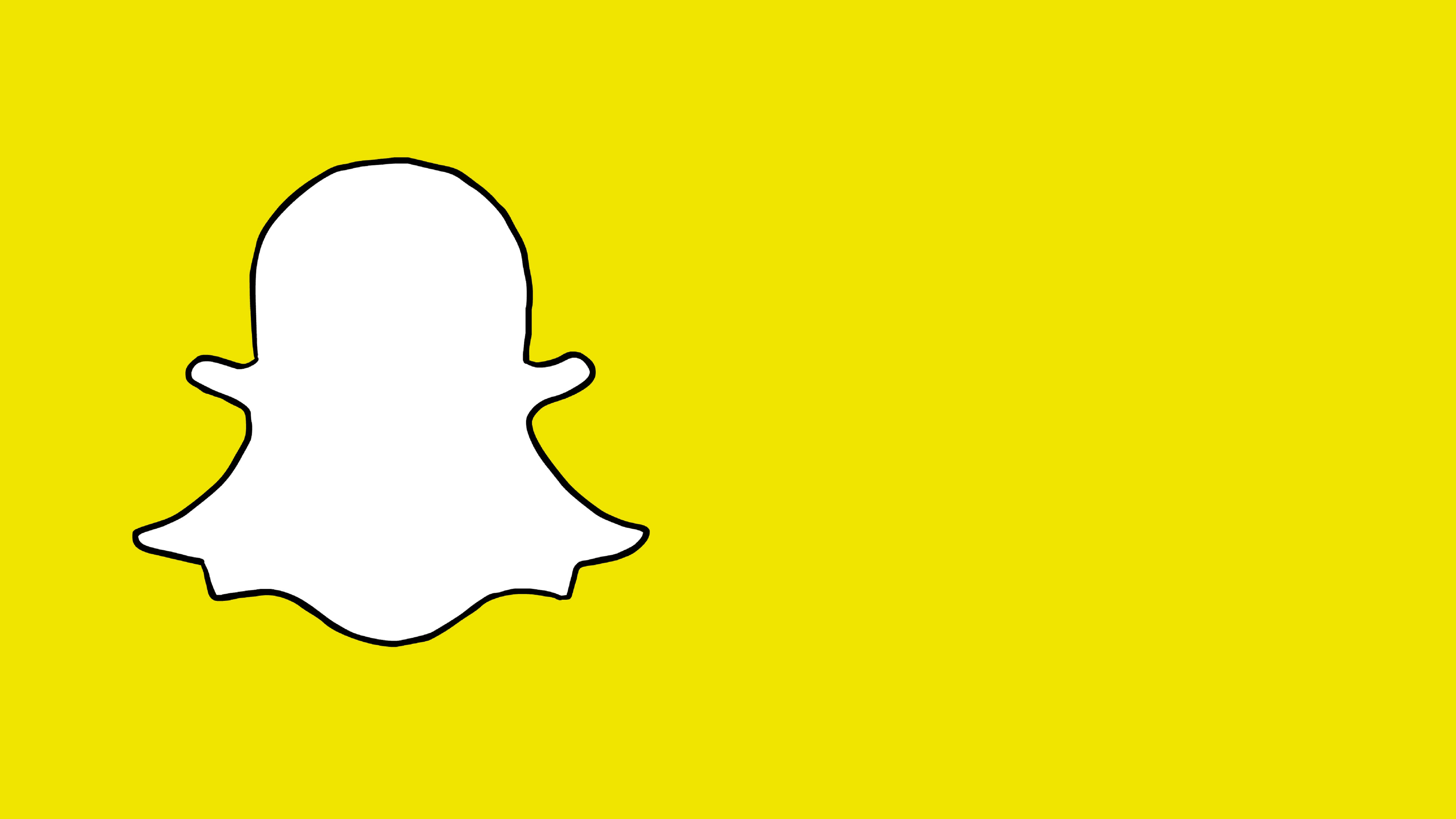 Snapchat 桌布 壁紙 — 一個極簡風格的白色 Snapchat 鬼魂標誌，以黑色輪廓勾勒在純亮黃色背景上。