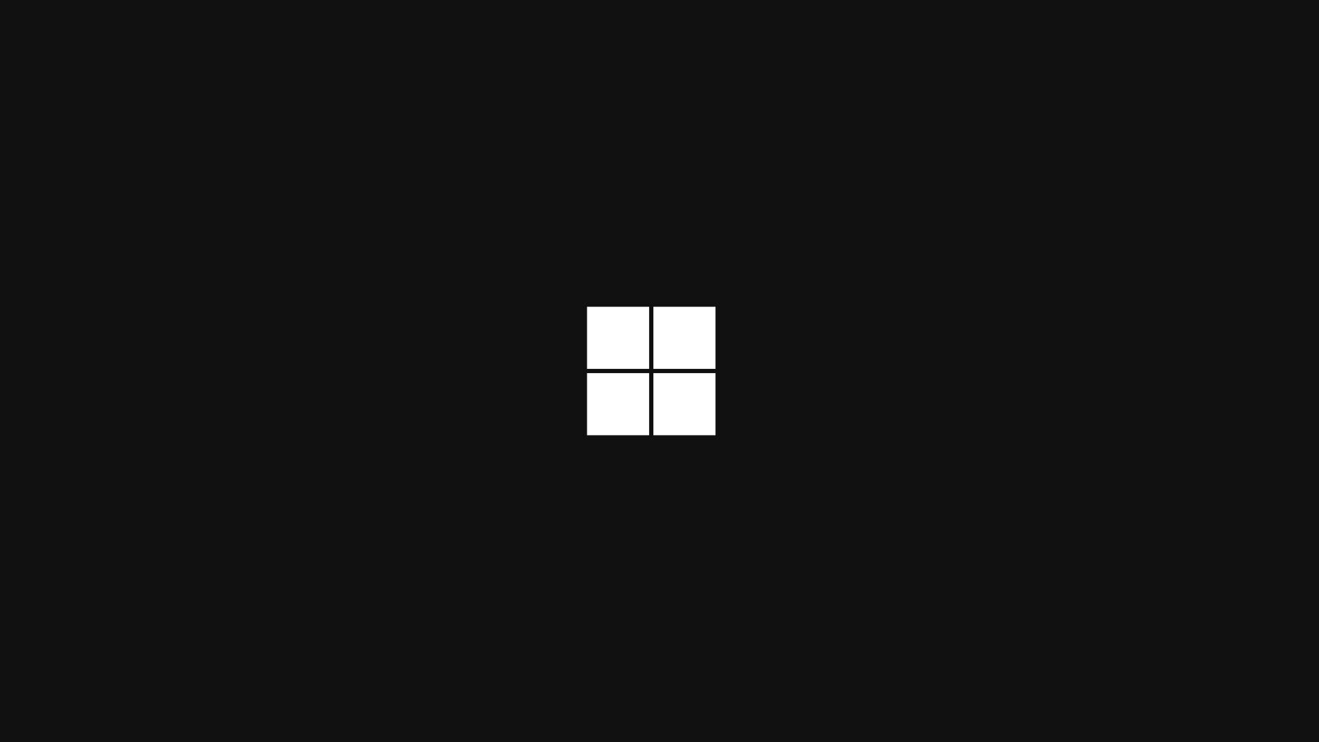Dark Windows 桌布 壁紙 — 一個極簡風格的白色四格窗戶標誌，居中放置在純黑色背景上。