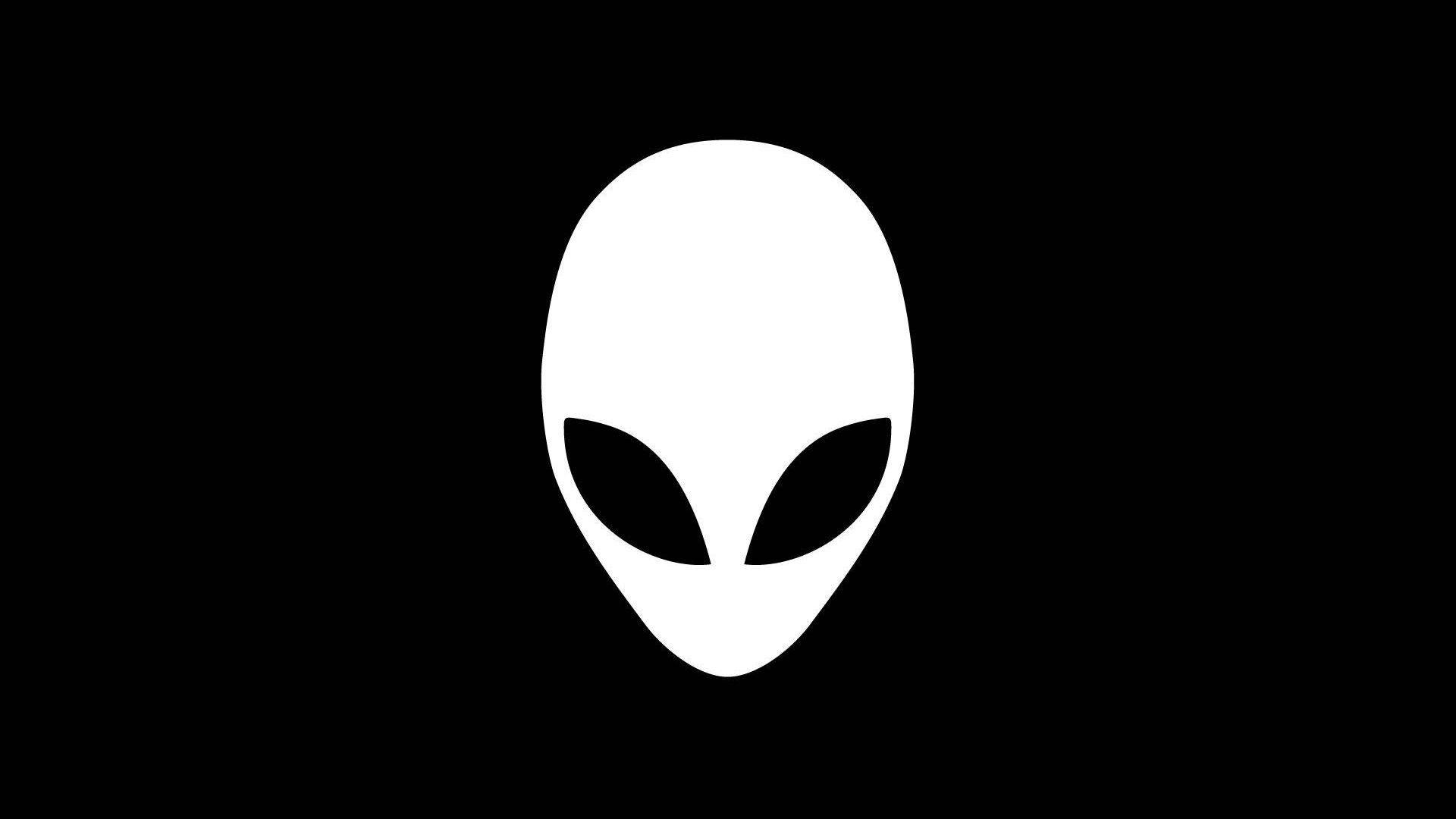 外星人 桌布 壁紙 — 一個極簡風格的白色外星人頭像圖示，帶有大黑眼睛，居中在純黑色背景上。