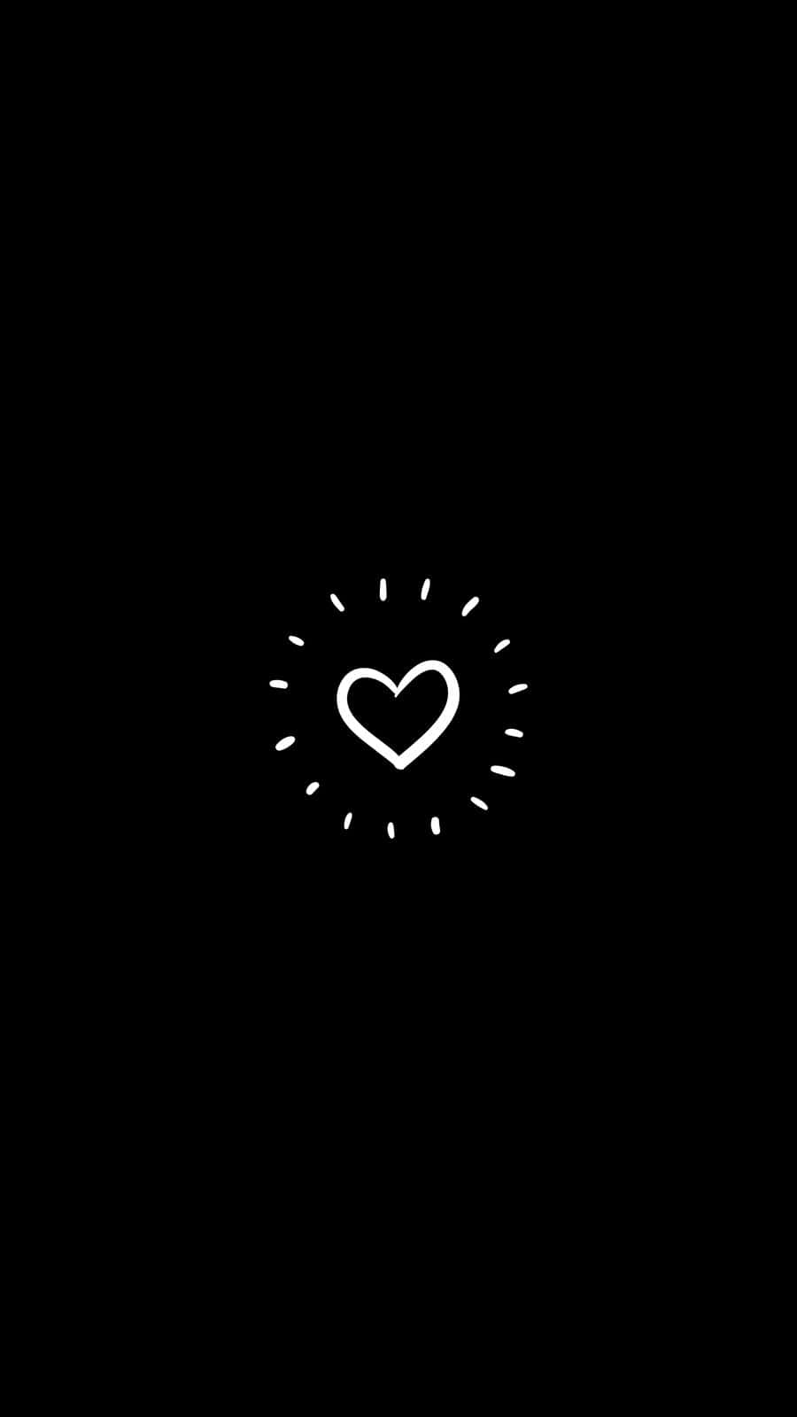 Cartoon Heart 桌布 壁紙 — 一個極簡風格的白色心形圖示，帶有放射狀虛線，居中於純黑色背景上。