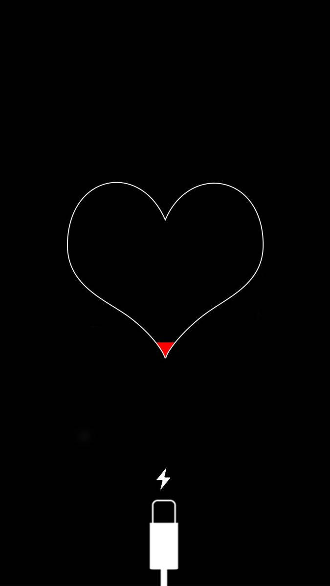 White Heart 桌布 壁紙 — 一個極簡風格的白色心形輪廓，尖端為紅色，正在黑色背景上被白色USB線充電。
