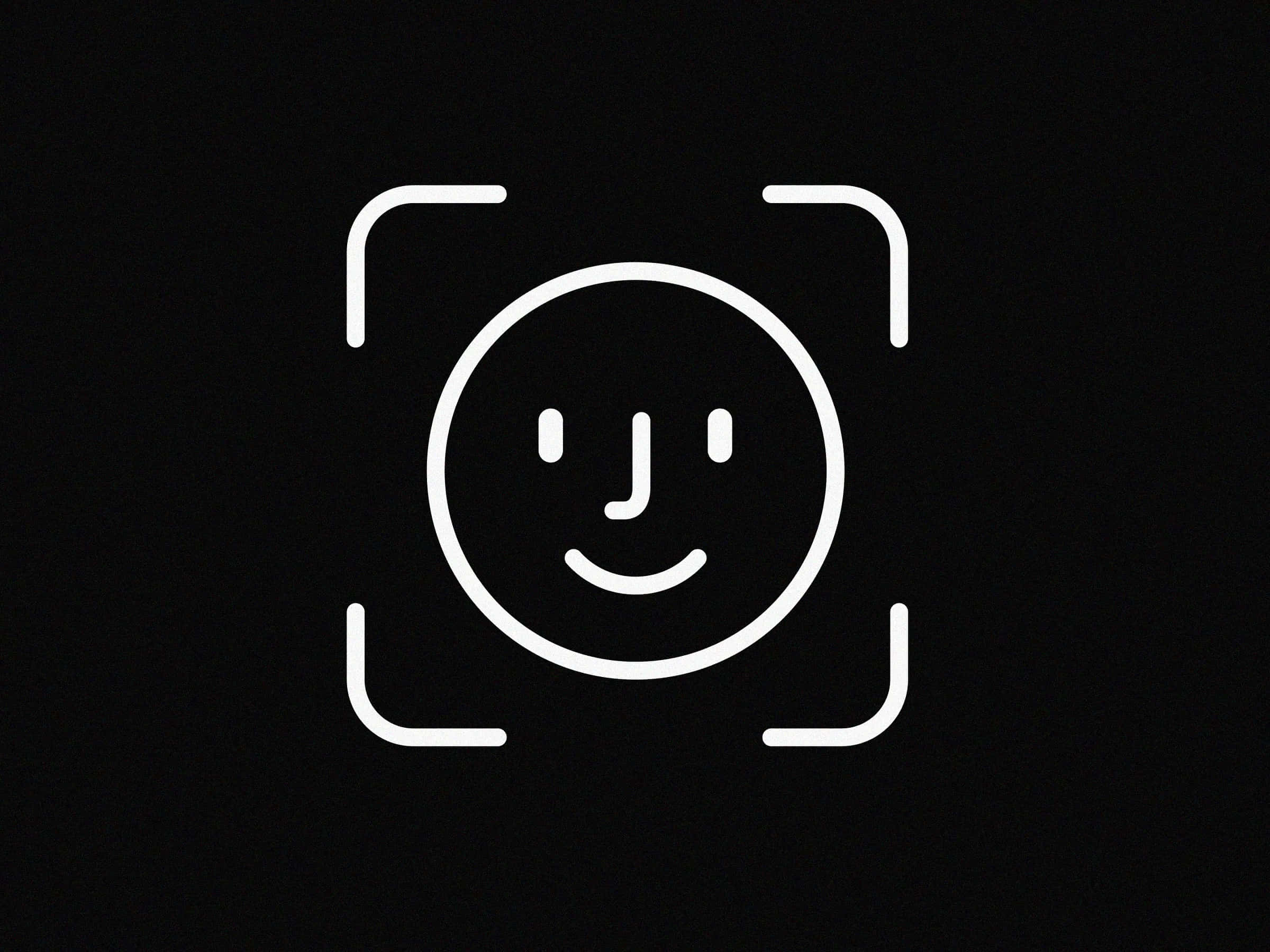 Face Id 桌布 壁紙 — 一個極簡風格的白色線條笑臉，居中於黑色背景上的相機觀景窗框內。