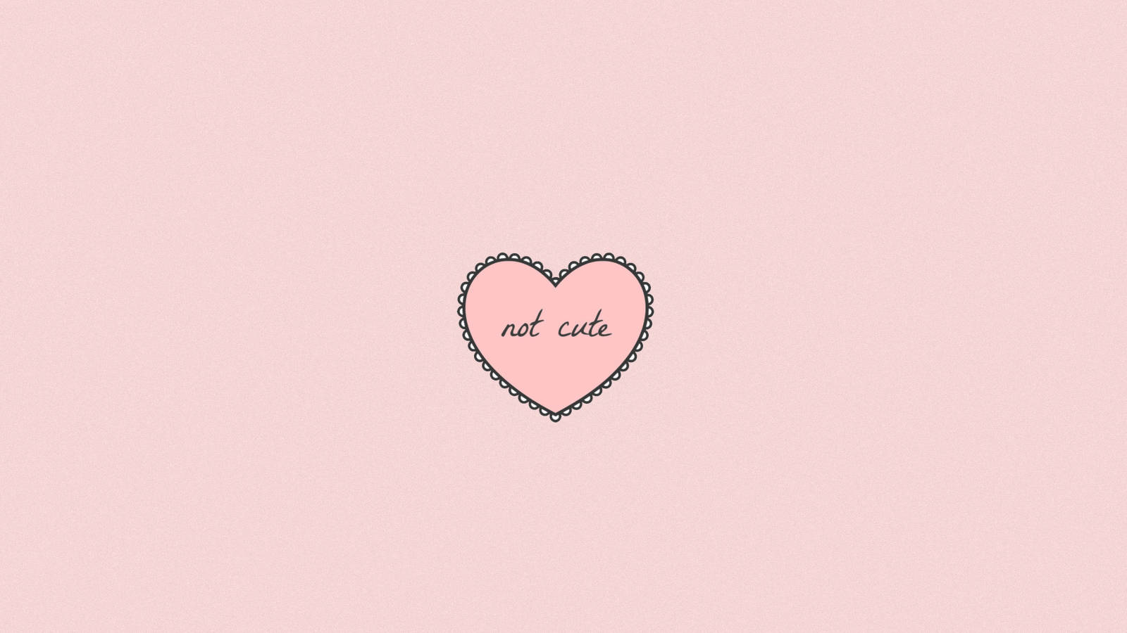 Cute Heart 桌布 壁紙 — 一個極簡風格的粉紅色心形，帶有扇形邊緣，文字 not cute 居中在柔和的粉紅色背景上。