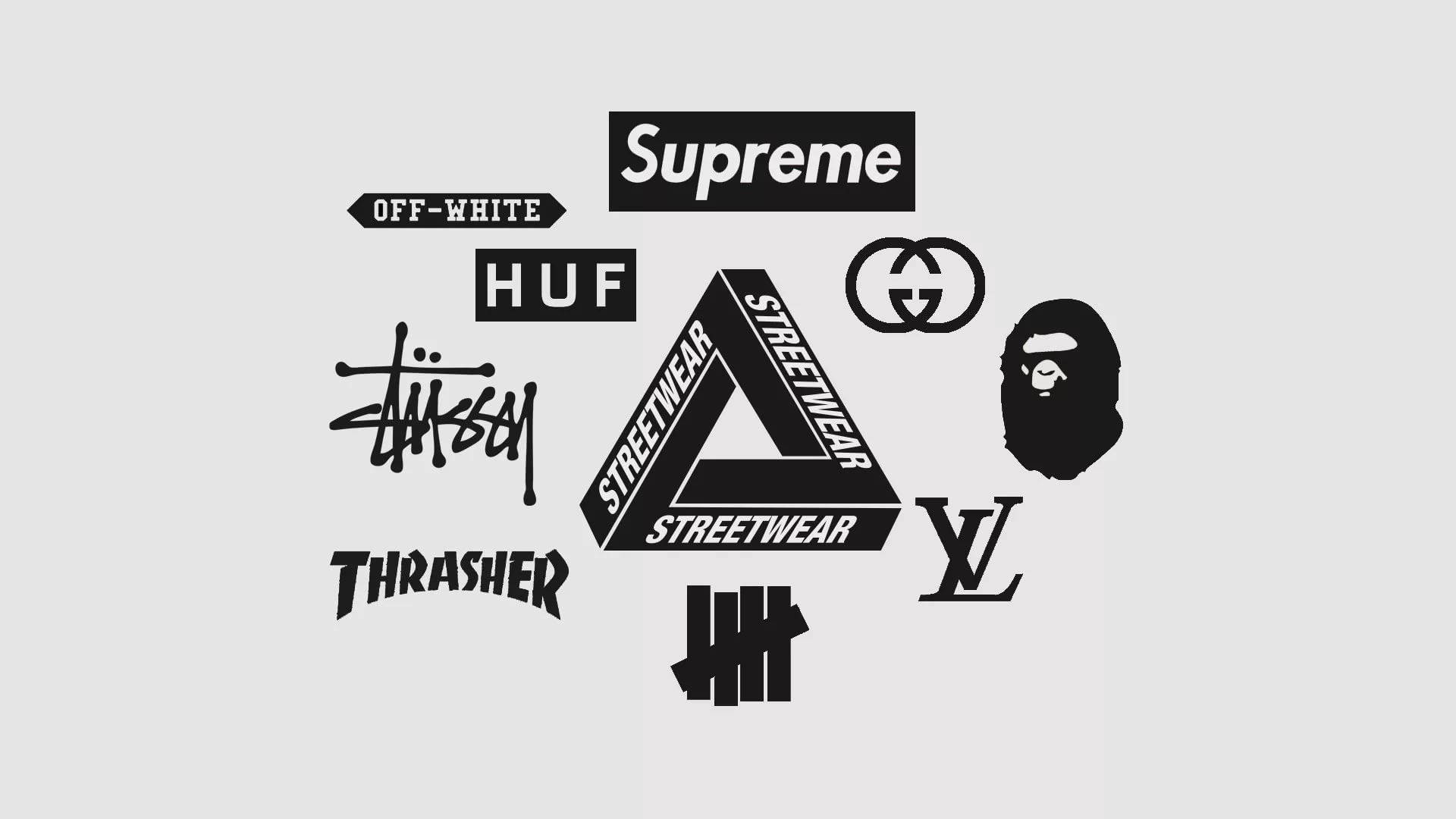Off White Logo 桌布 壁紙 — 一個極簡風格的系列，展示標誌性街頭服飾和奢侈品牌標誌，以黑色呈現於淺灰色背景上。