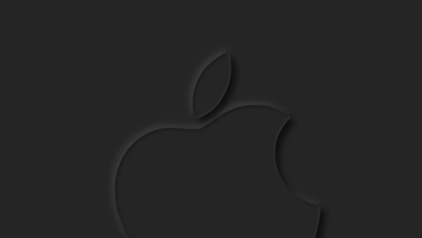 Black Apple Logo 桌布 壁紙 — 一個極簡黑色Apple標誌，在深炭灰色背景上帶有柔和陰影深度，低調壓印。
