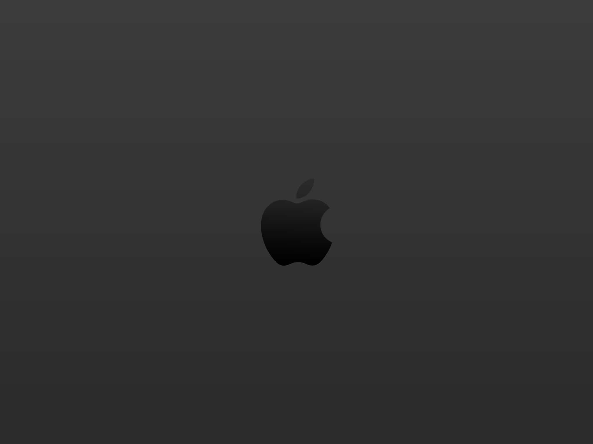 蘋果標誌 桌布 壁紙 — 一個極簡黑色Apple標誌，居中於深灰色漸變背景上。