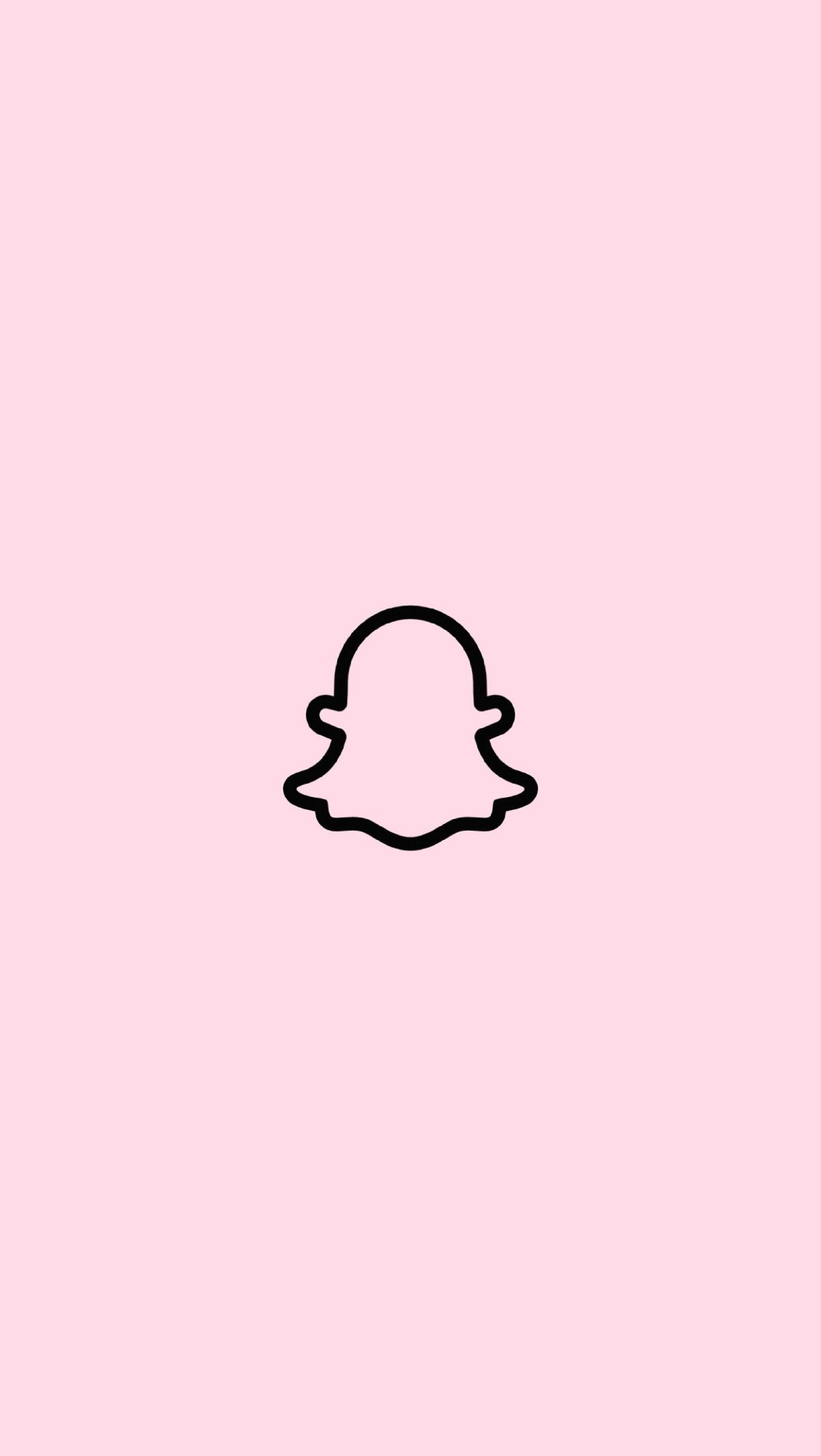 Snapchat 桌布 壁紙 — 一個極簡黑色Snapchat鬼魂標誌，居中於柔和的粉紅色背景上。