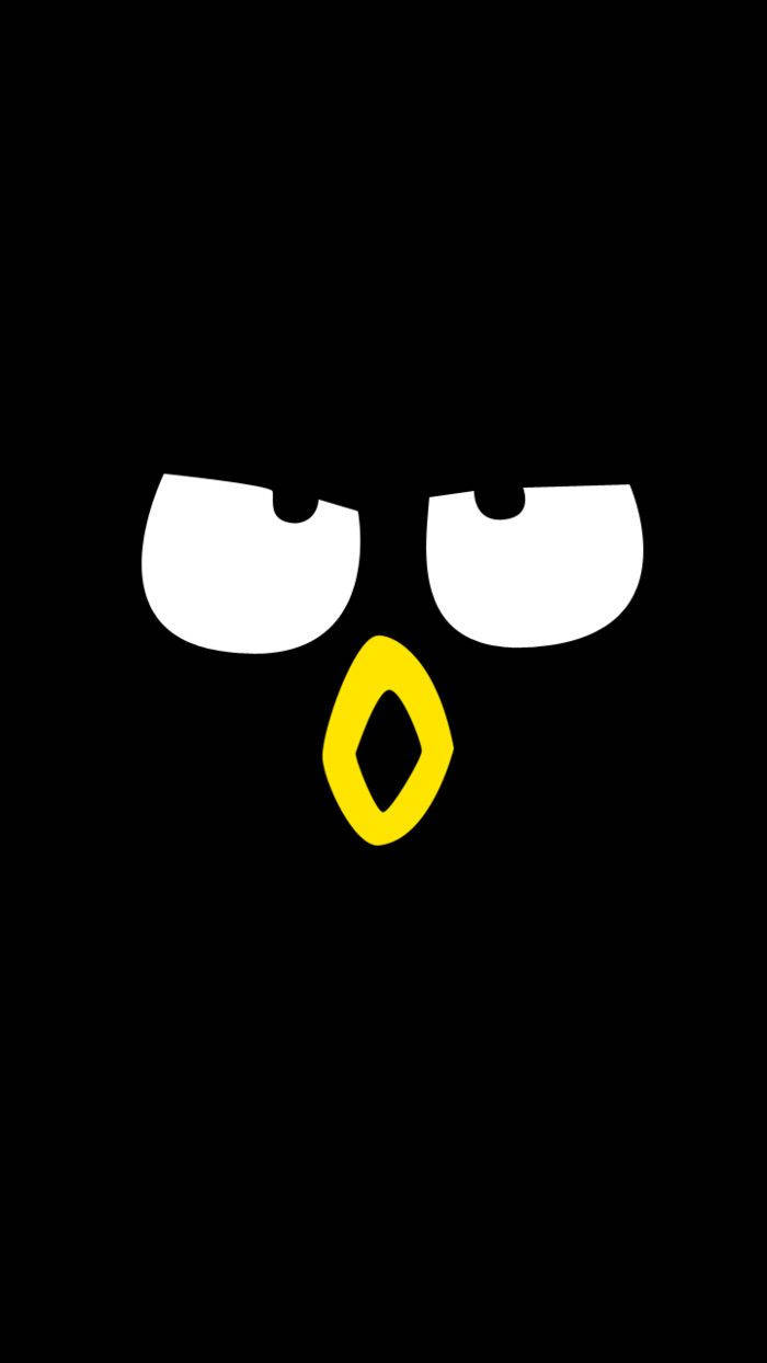 Badtz Maru 桌布 壁紙 — 一個極簡黑色背景上有一隻卡通企鵝的臉，有白色的眼睛和黃色的喙。