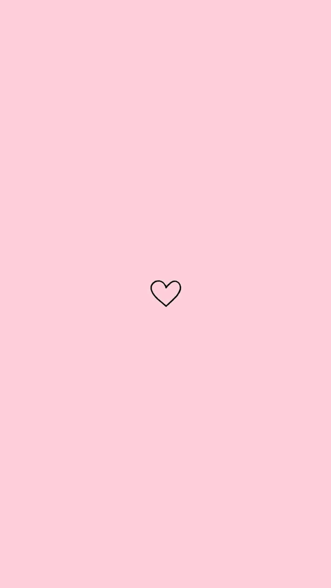 Instagram 桌布 壁紙 — 一個極簡黑色輪廓心形，置於柔和粉紅色背景中央。
